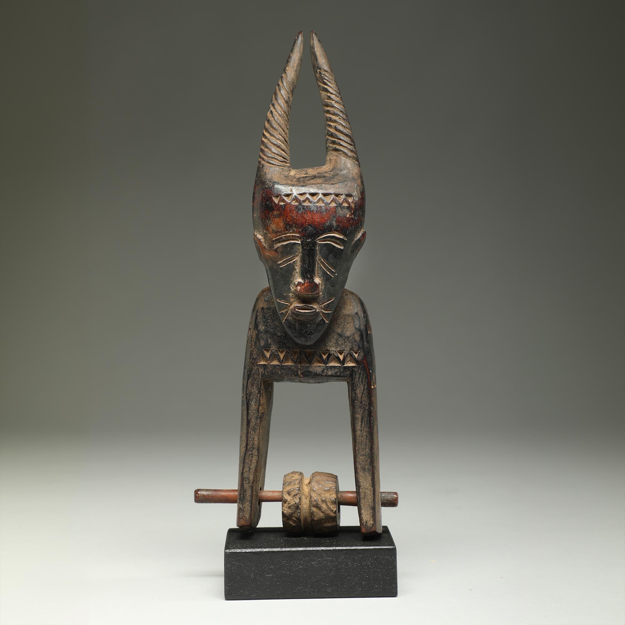 Baule Antílope Humano Madera Vieja Telar de lizos Polea Costa de Marfil África en venta 1