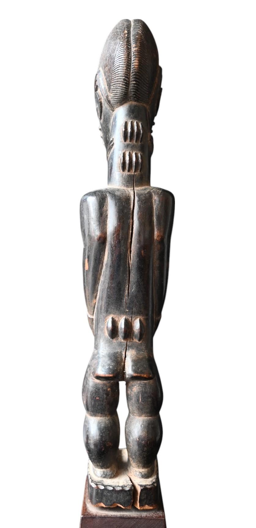 Baule “Blolo Bian” Statue – Côte d’Ivoire, Early 20th Century For Sale 4