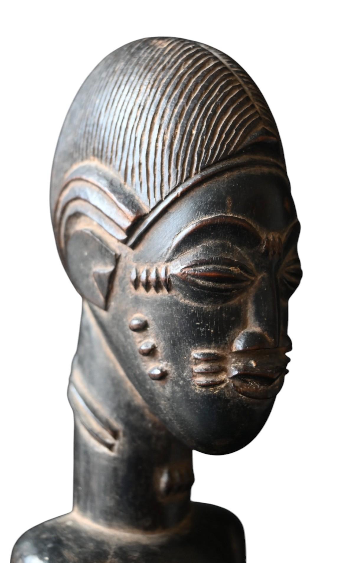 Tribal Baule “Blolo Bian” Statue – Côte d’Ivoire, Early 20th Century For Sale