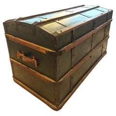 Twentieth century travel trunk made of wood leather and iron