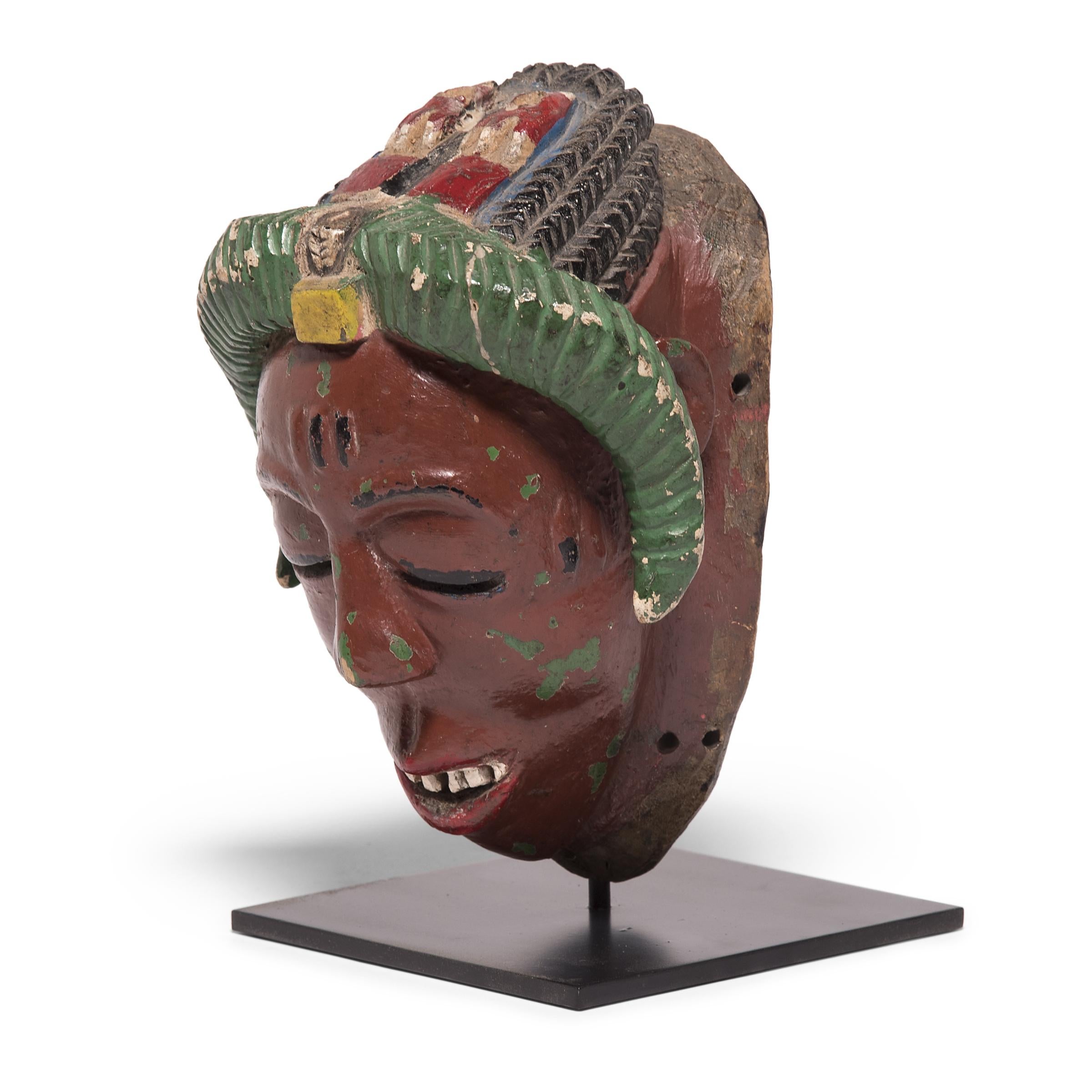 Hand-Carved Baule Painted Kpan Mask For Sale
