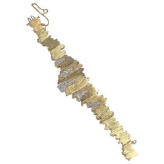 Baum Mercier 1960er Jahre Gelbgold und Diamant Eisberg versteckt Armband Armbanduhr