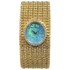 Baum & Mercier Gold Diamond and Opal Dial Ladies Bracelet Wristwatch