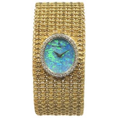 Baum & Mercier Gold Diamant und Opal Zifferblatt Damen Armband Armbanduhr