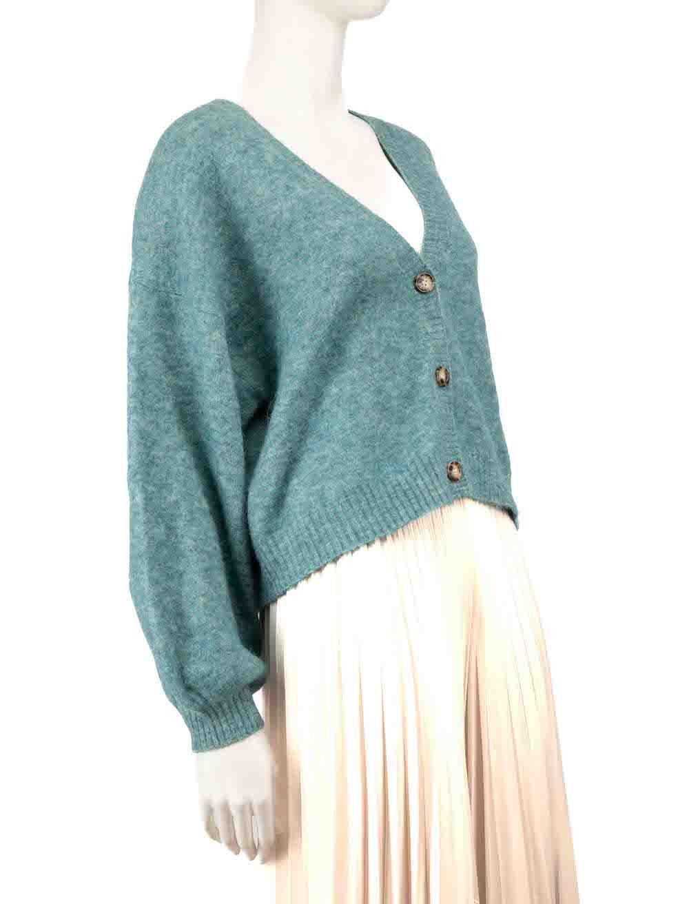 CONDITION is Never worn, with tags. No visible wear to cardigan is evident on this new Baum und Pferdgarten designer resale item.
 
 
 
 Details
 
 
 Turquoise
 
 Wool
 
 Cardigan
 
 Knitted and stretchy
 
 Front button up closure
 
 Cropped length
