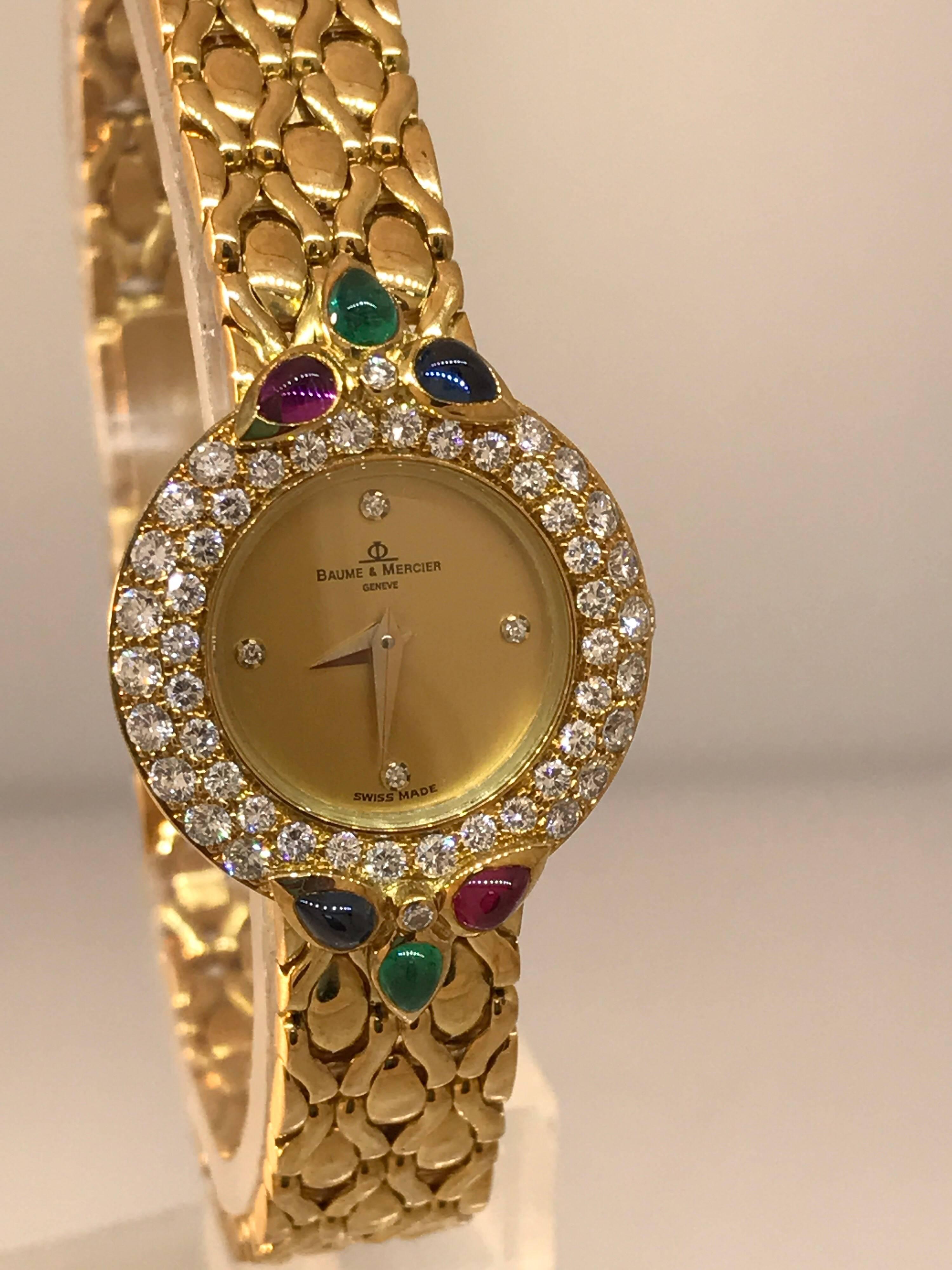 Baume & Mercier Lady's Watch

Model Number: 16782

100% Authentic

Pre-owned

Comes with Baume & Mercier watch box

18 Karat Yellow Gold Case & Bracelet

Bezel set with Diamonds, Rubies, Emeralds & Sapphires

Champagne Dial

Case Size: 23mm

Watch
