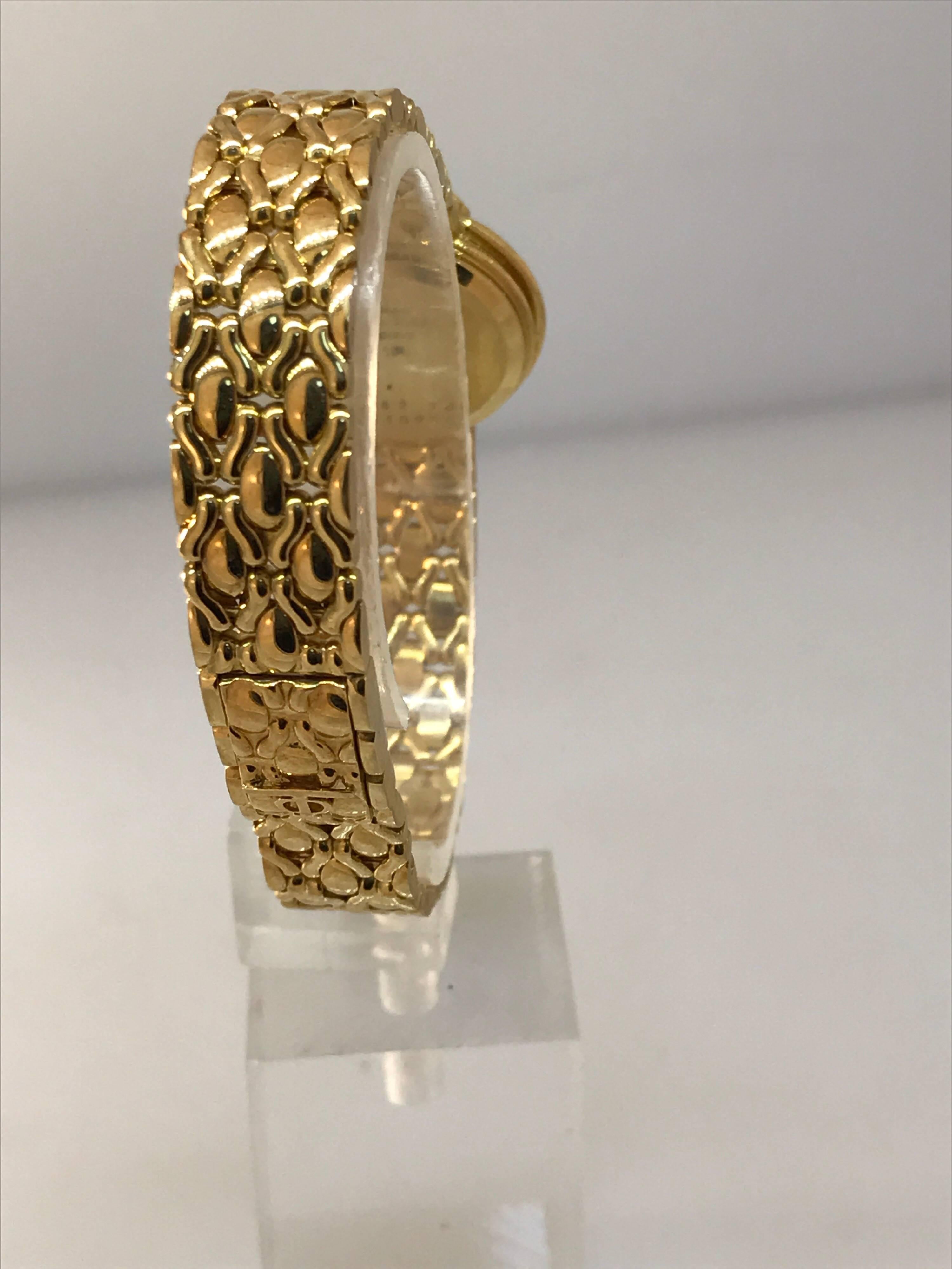Baume & Mercier 18K Gold Lady's watch with Diamonds, Rubies, Emeralds, Sapphires For Sale 1