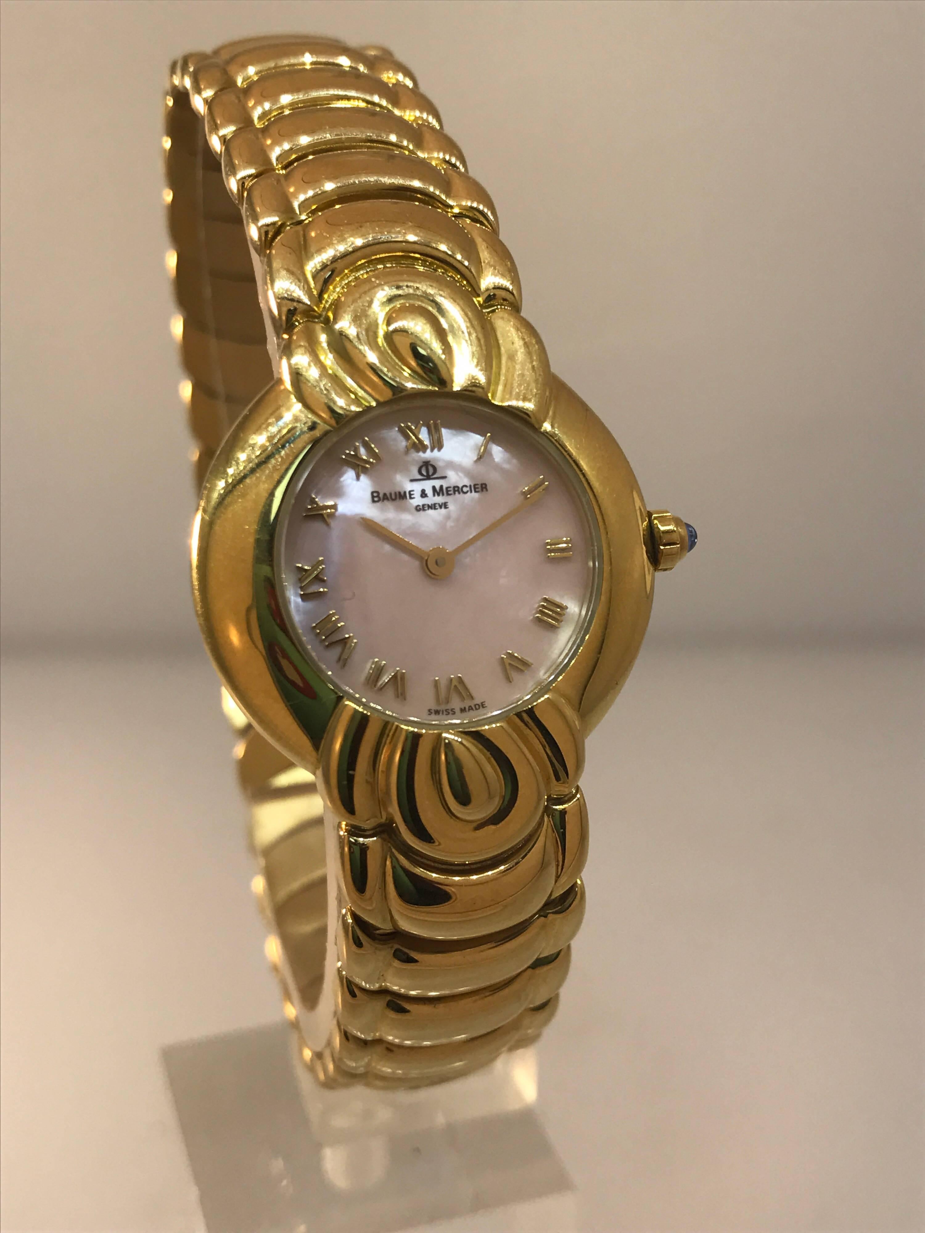 Baume & Mercier 18 Karat Gold Pink Mother-of-Pearl Dial Bracelet Women's Watch In Excellent Condition For Sale In New York, NY