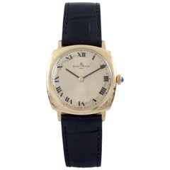 Montre pour homme Baume et Mercier en or 18 carats avec coussin et bracelet en cuir noir