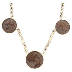 Collana Baume Creation con pietra lavica e cammeo in oro giallo 18 carati