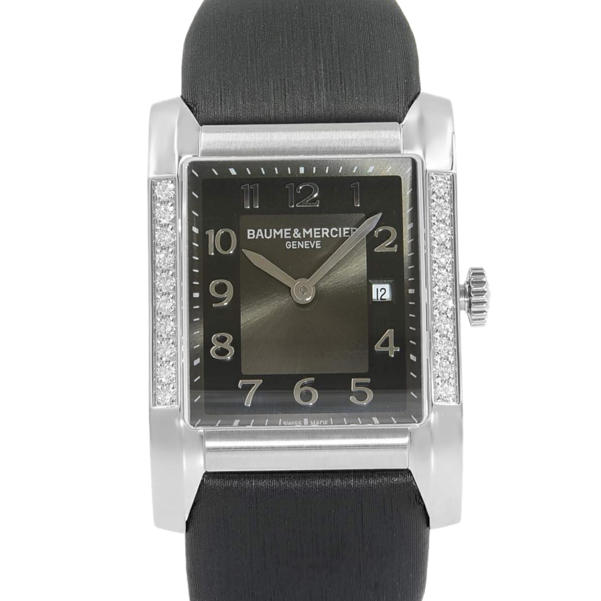 This  never been worn  Baume et Mercier Hampton  10022 is a beautiful Ladies timepiece that is powered by a quartz movement which is cased in a stainless steel case. It has a  rectangle shape face, date, diamonds dial and has hand arabic numerals