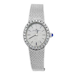 Baume et Mercier Ladies Antique Watch with Diamond Bezel and Blue Sapphire Crown