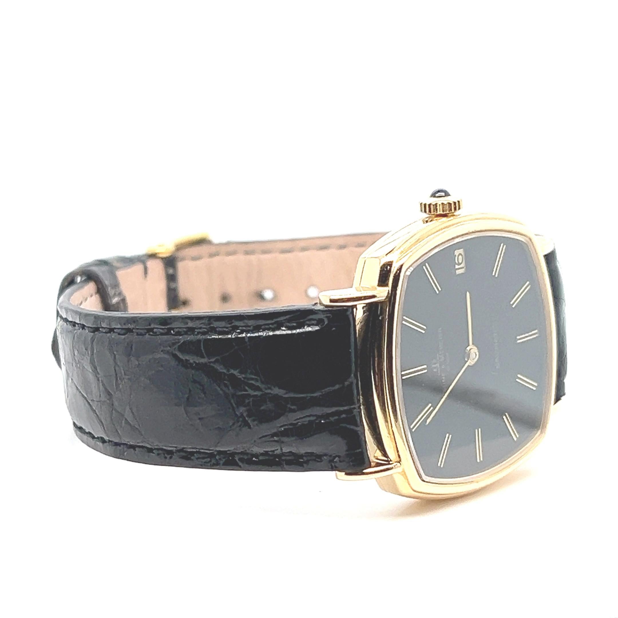 Baume et Mercier Yellow Gold 18 Carats Black Leather Strap Cushion Shape Watch In Excellent Condition For Sale In Vannes, FR