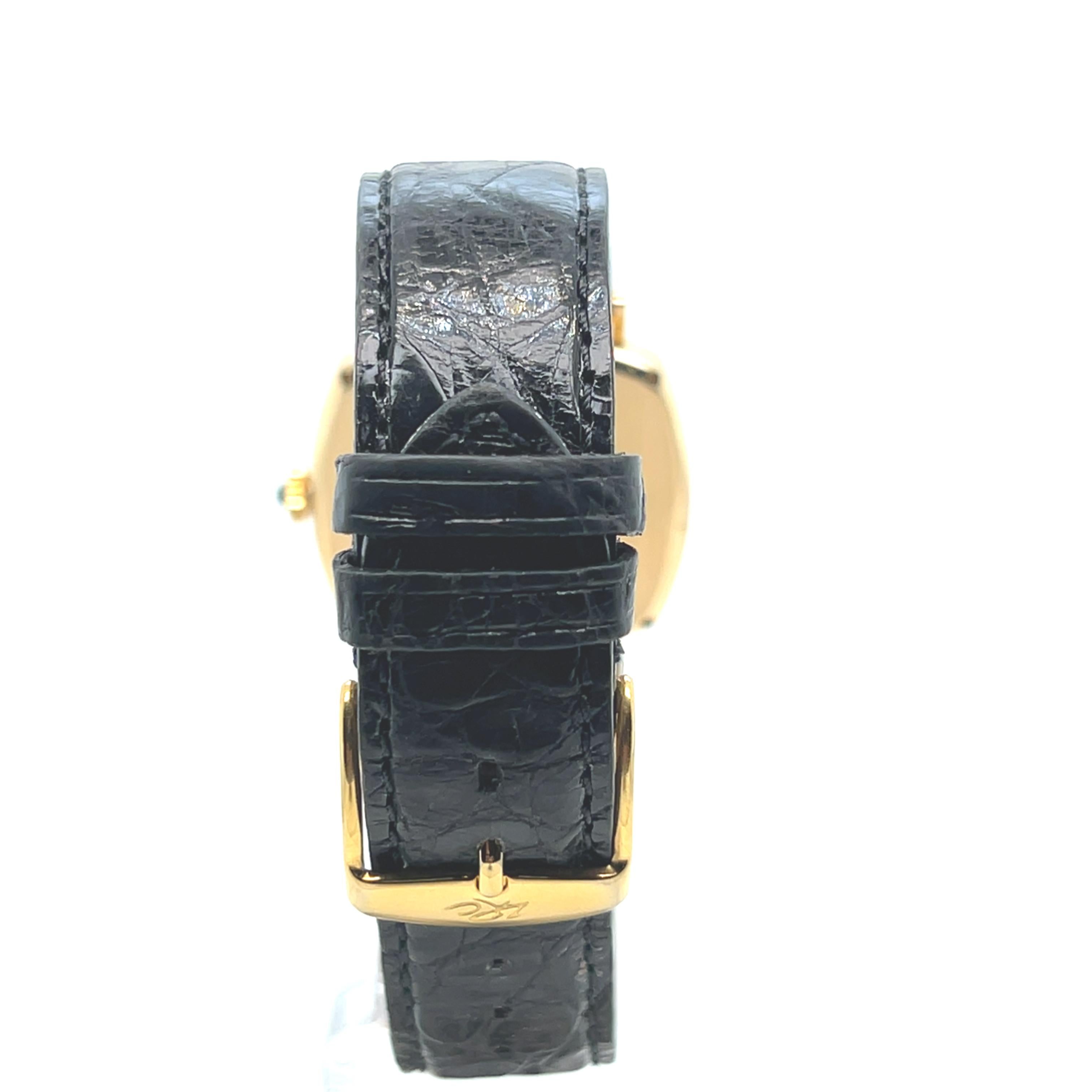 Women's or Men's Baume et Mercier Yellow Gold 18 Carats Black Leather Strap Cushion Shape Watch For Sale