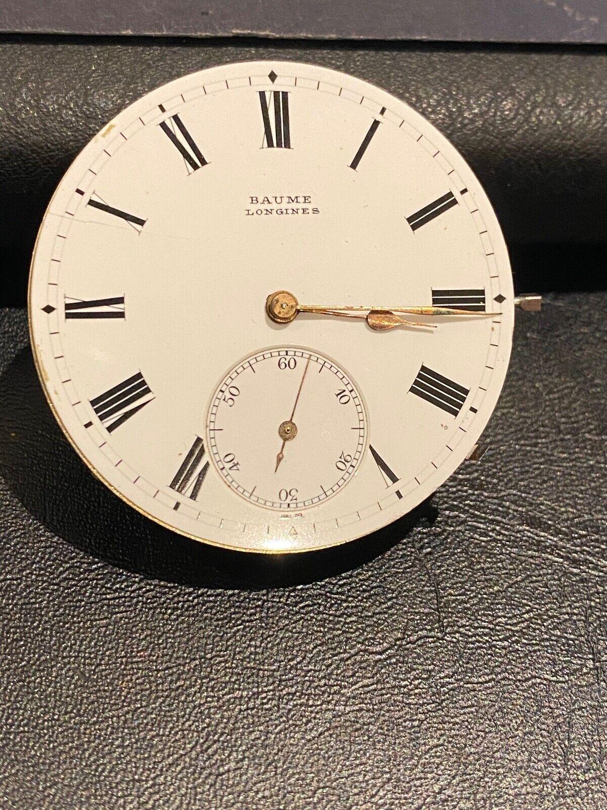 Movimiento de reloj de bolsillo Baume Longines 

Esfera de porcelana 
con números romanos 
41mm 

en funcionamiento 