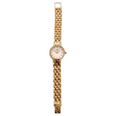 Baume & Mercier 14 Karat Yellow Gold, Diamond and Mother of Pearl Watch