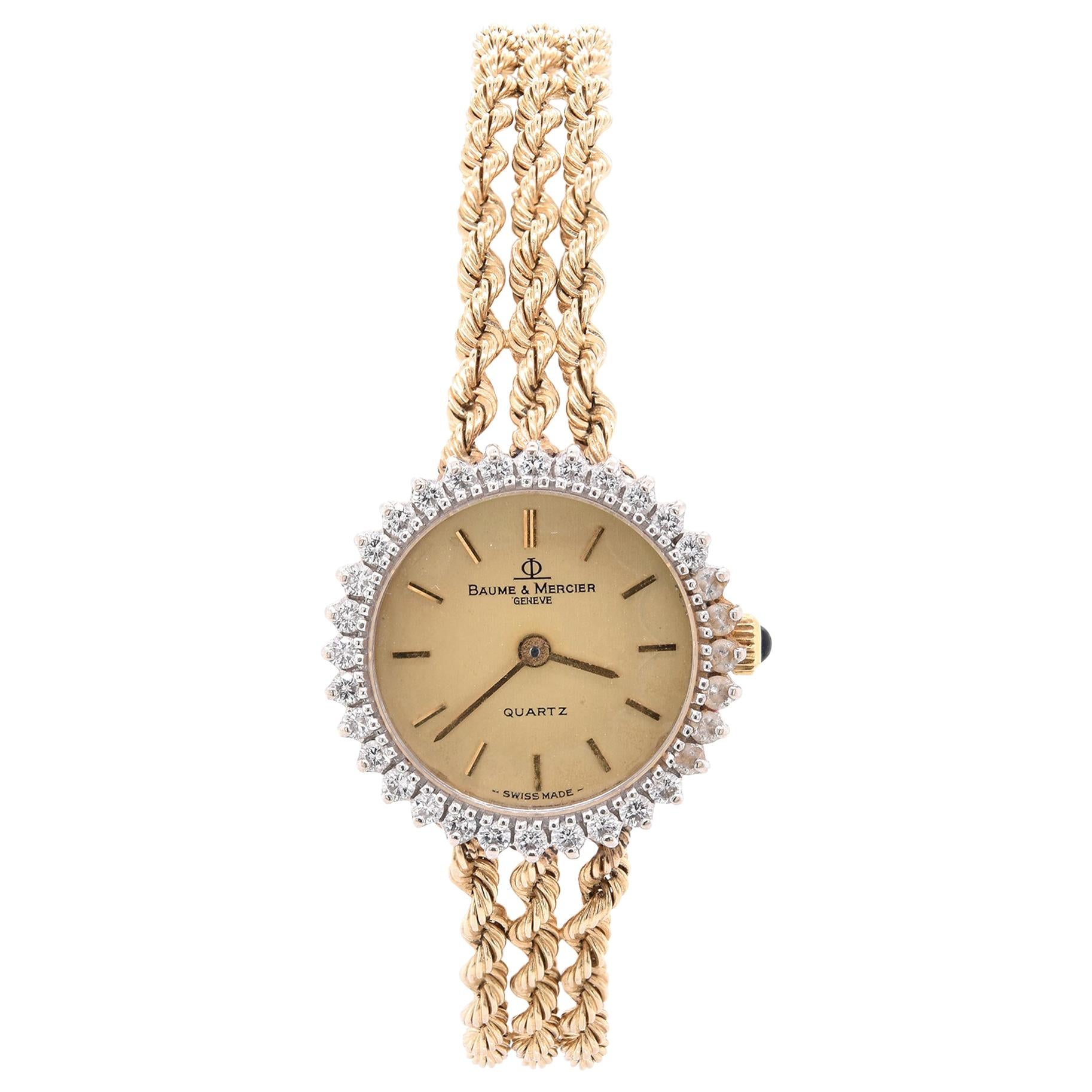 Baume 
Mercier 14 Karat Yellow Gold Vintage Ladies Watch with Diamond Bezel