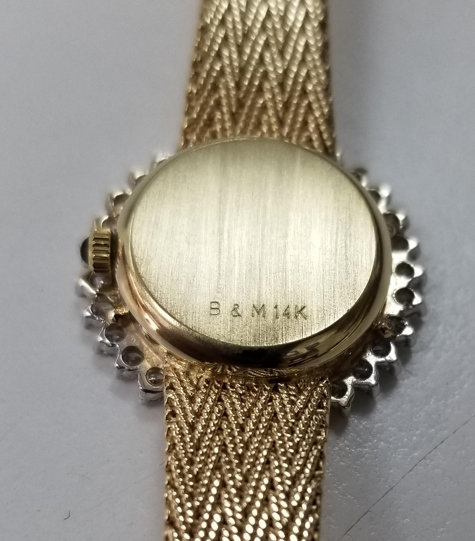 baume and mercier gold watch with diamonds