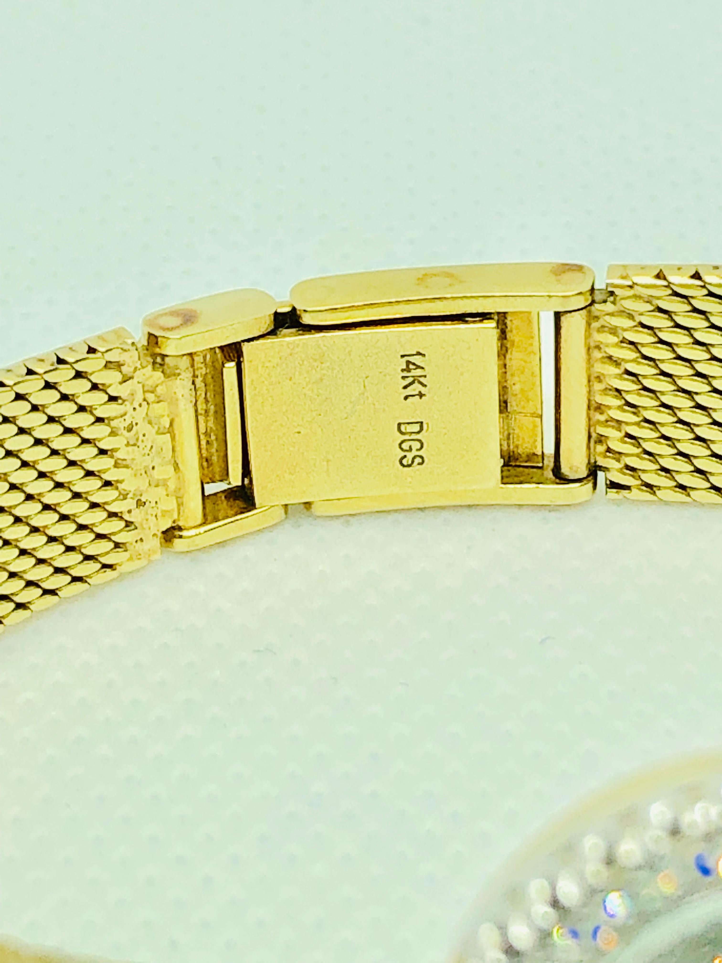Contemporary Baume & Mercier 14 Karat Yellow Gold and Diamond Vintage Ladies Watch