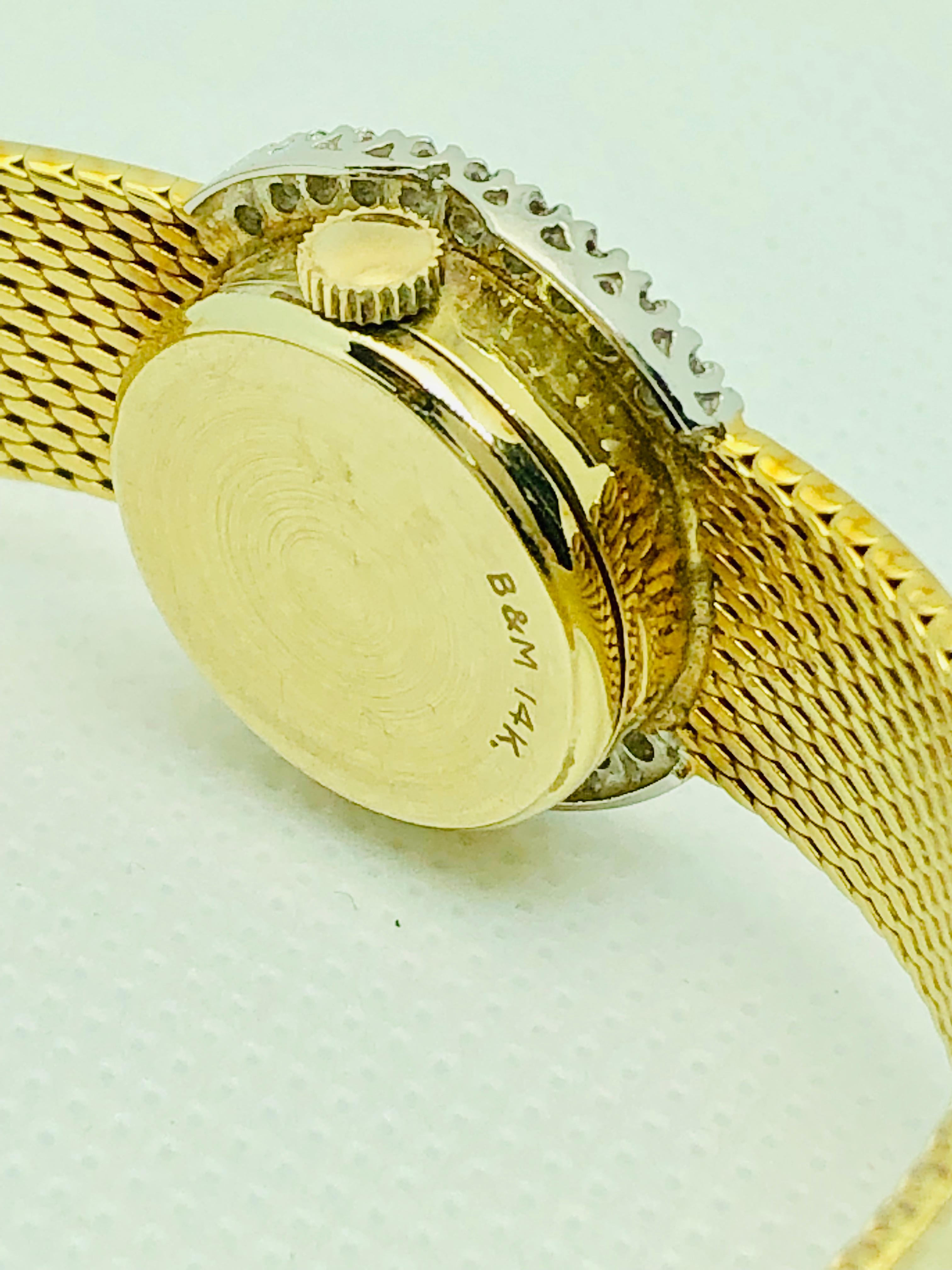 Round Cut Baume & Mercier 14 Karat Yellow Gold and Diamond Vintage Ladies Watch