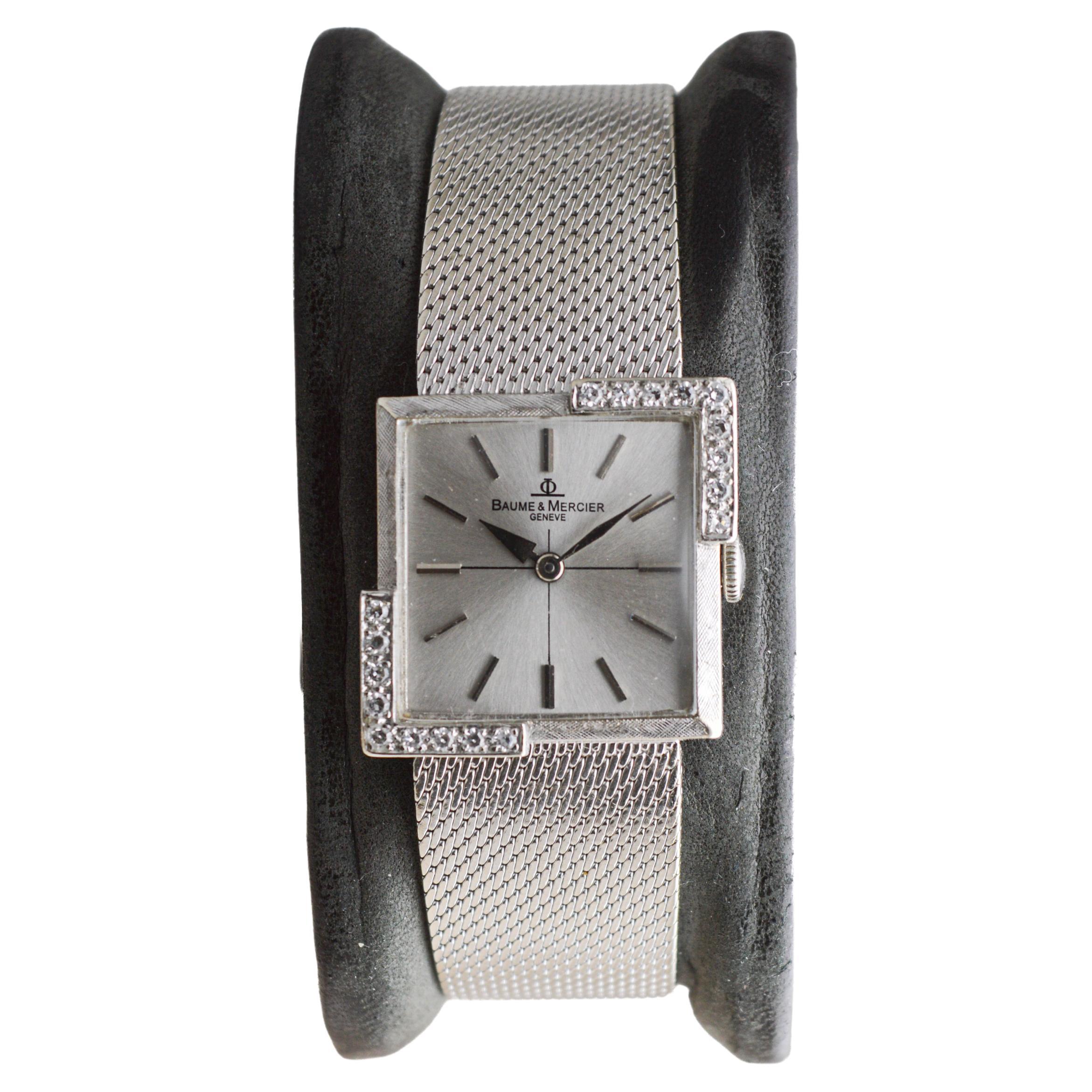 FACTORY / HOUSE: Baume Mercier Watch Company
STYLE / REFERENCE: Bracelet  Style Dress Watch
METAL / MATERIAL: 14Kt. Solid White Gold 
CIRCA / YEAR: 1960's 
DIMENSIONS / SIZE: Length 23mm X Width 23mm
MOVEMENT / CALIBER: Manual Winding / 17 Jewels /