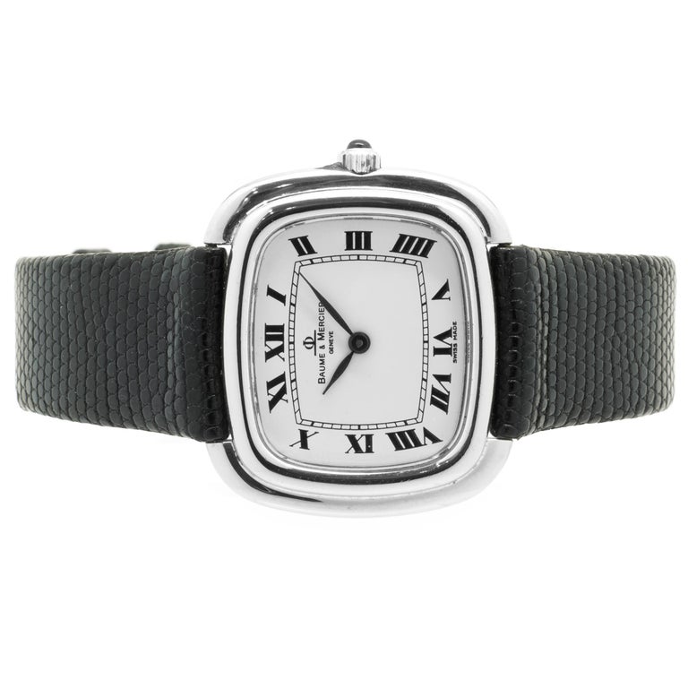Movement: quartz
Function: hours, minutes
Case: 30.5mm 18K white gold rectangular case
Band: black lizard strap with buckle 
Dial: white roman dial
Serial # 652XXX
Reference # vintage dress


No box or papers
Guaranteed to be authentic by seller.
