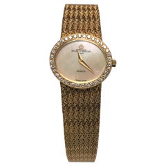 Baume & Mercier Montre à diamant en or jaune 18 carats