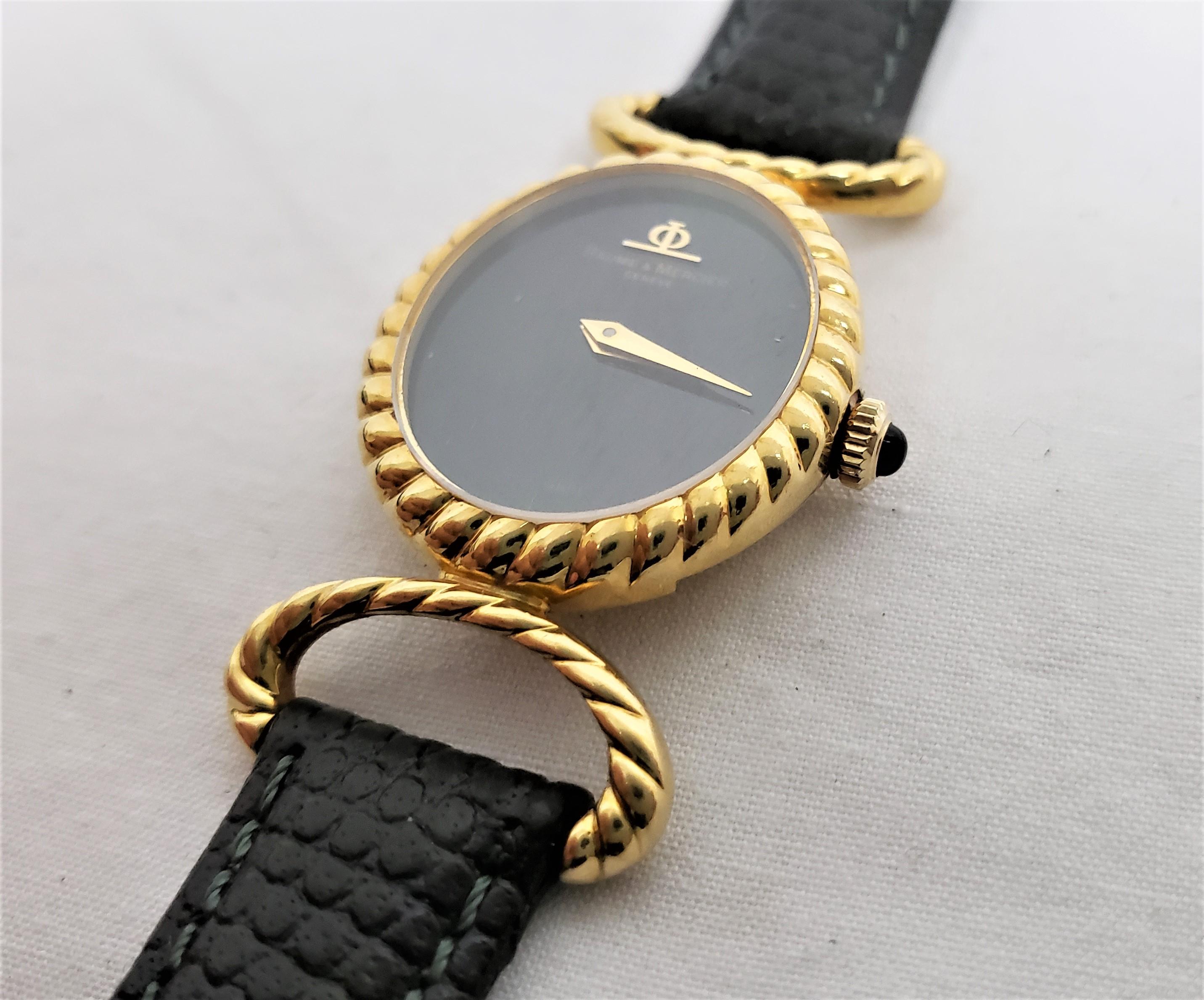 Mid-Century Modern Baume Mercier 18 Karat Yellow Gold Ladies Wristwatch with Original Leather Band For Sale