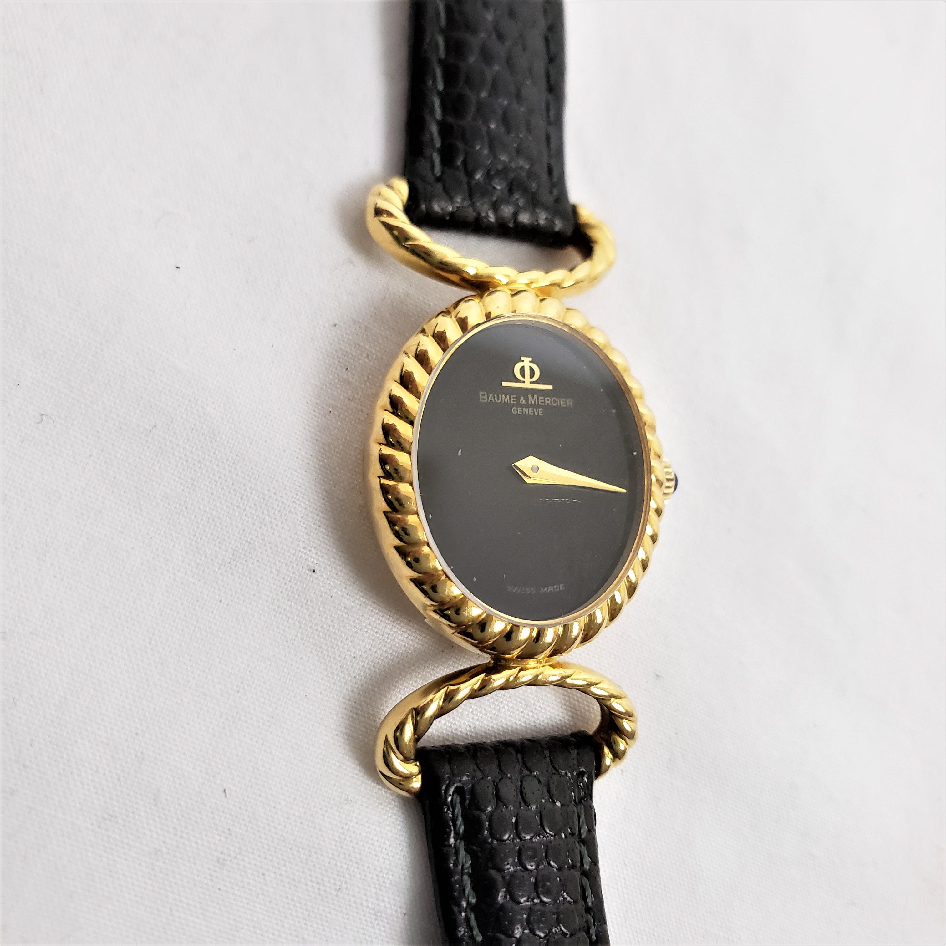 Swiss Baume Mercier 18 Karat Yellow Gold Ladies Wristwatch with Original Leather Band For Sale