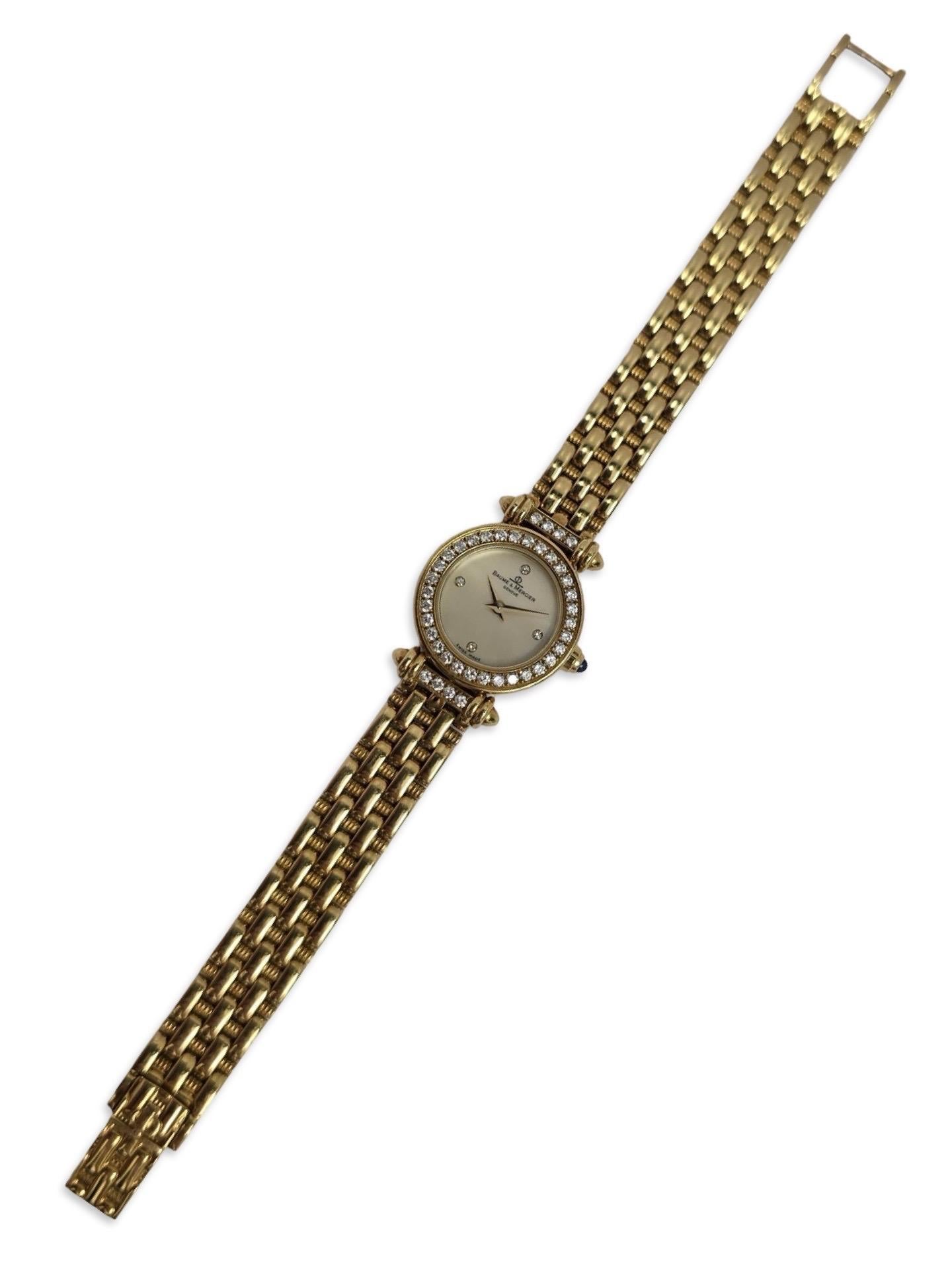 Round Cut Baume & Mercier 18K Gold Diamond Bezel Ladies Watch, Quartz, Swiss Made For Sale