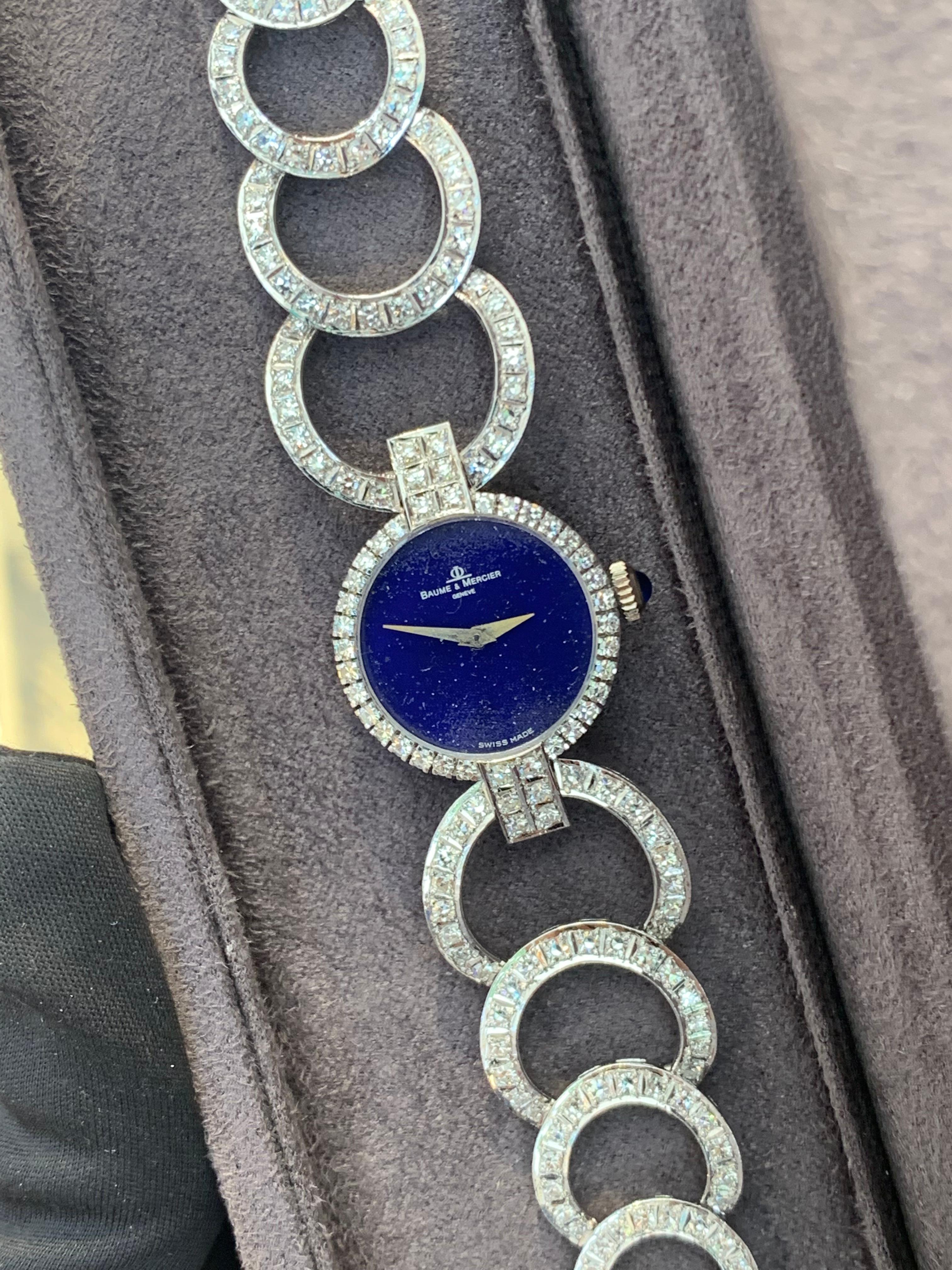 Baumé & Mercier, Swiss Made, In 18k White Gold, Factory Set With Diamonds.
Amazing Shine, Incredible Craftsmanship, Unbelievable Work Of Art.
Beautiful Lapis Lazuli Dial.
Extremely Rare Time Piece.
Great Statement Piece.
Approximately 10.0 Carats Of