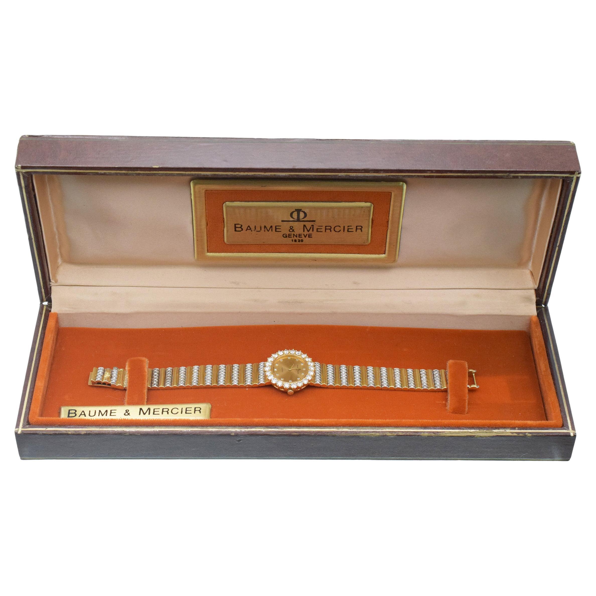 Montre Baume 
Mercier en or jaune 18 carats et diamants