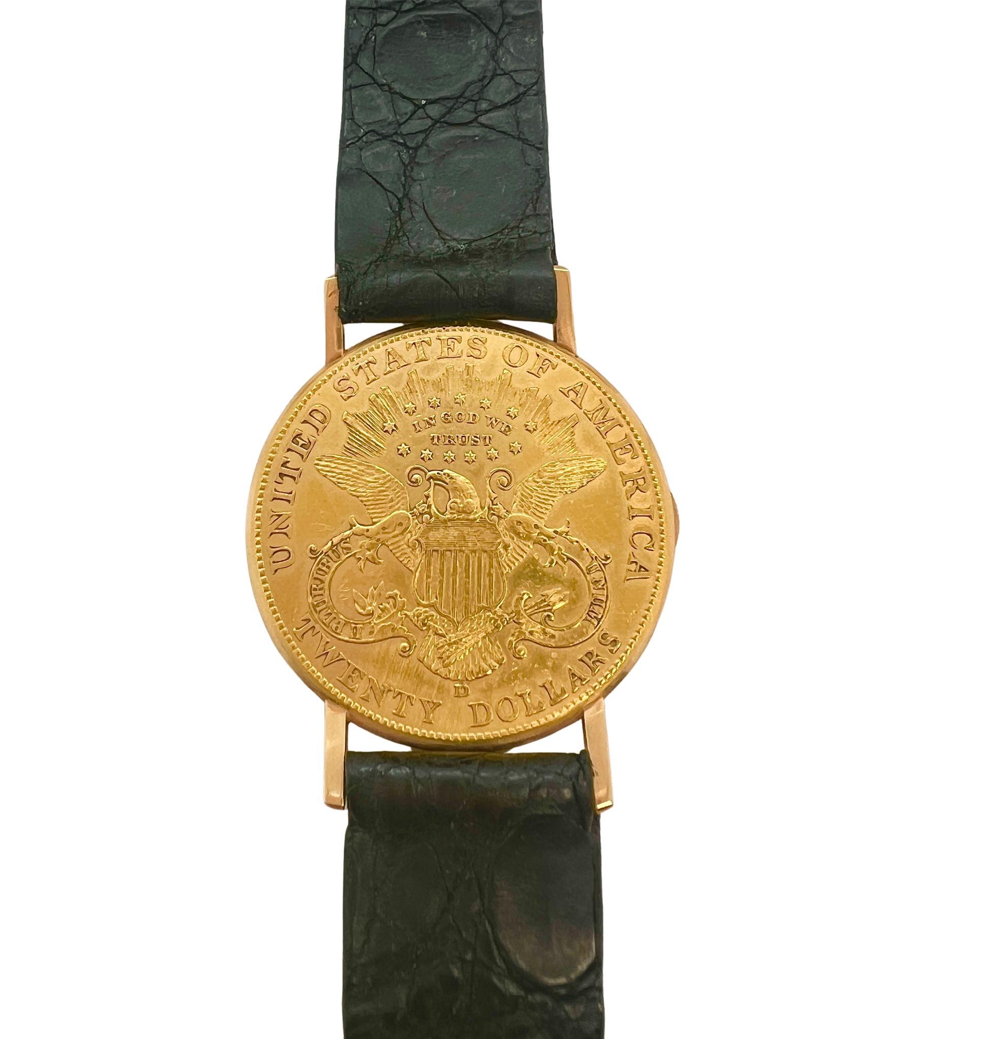 Baume & Mercier - Orologio a moneta con quadrante nascosto in oro giallo 18 ct.

Dettagli:
Produttore: Baume & Mercier 
Anno: circa anni '90
Dimensioni della cassa: circa 34 mm
Materiale della cassa: Oro giallo 18 carati e moneta d'oro da 20 dollari