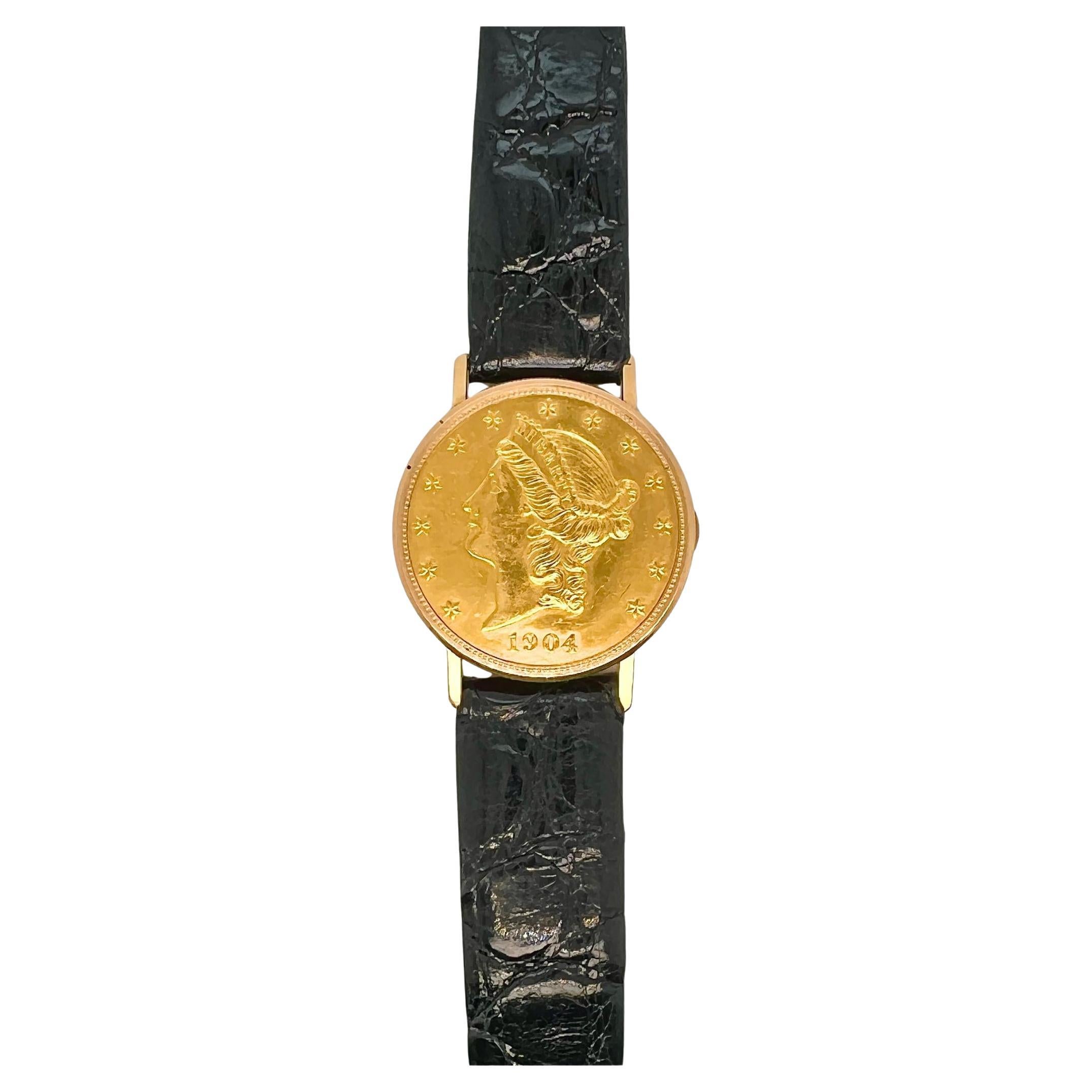 Baume & Mercier - Orologio a moneta con quadrante nascosto in oro giallo 18 ct.