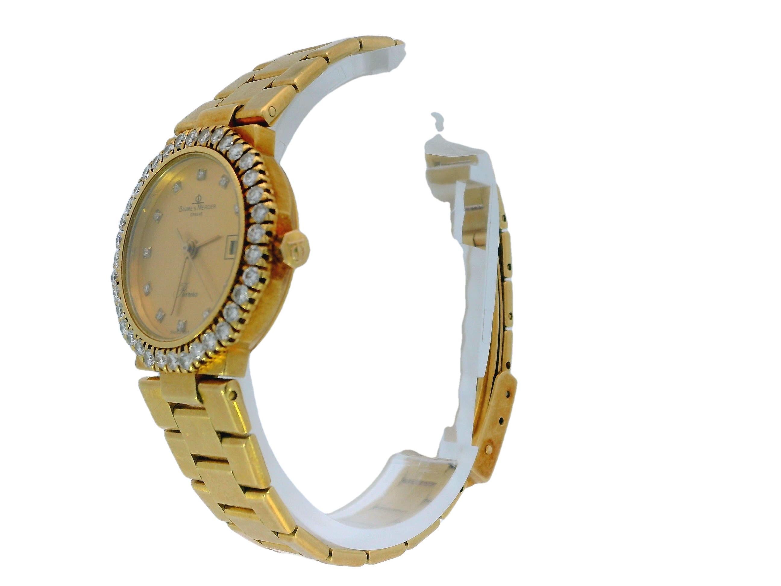 This luxurious Baume & Mercier Riviera watch features a round shape and quartz movement. The watch showcases a champagne dial adorned with diamond markers, adding a touch of elegance. Please note that the dial has some water marks, which are