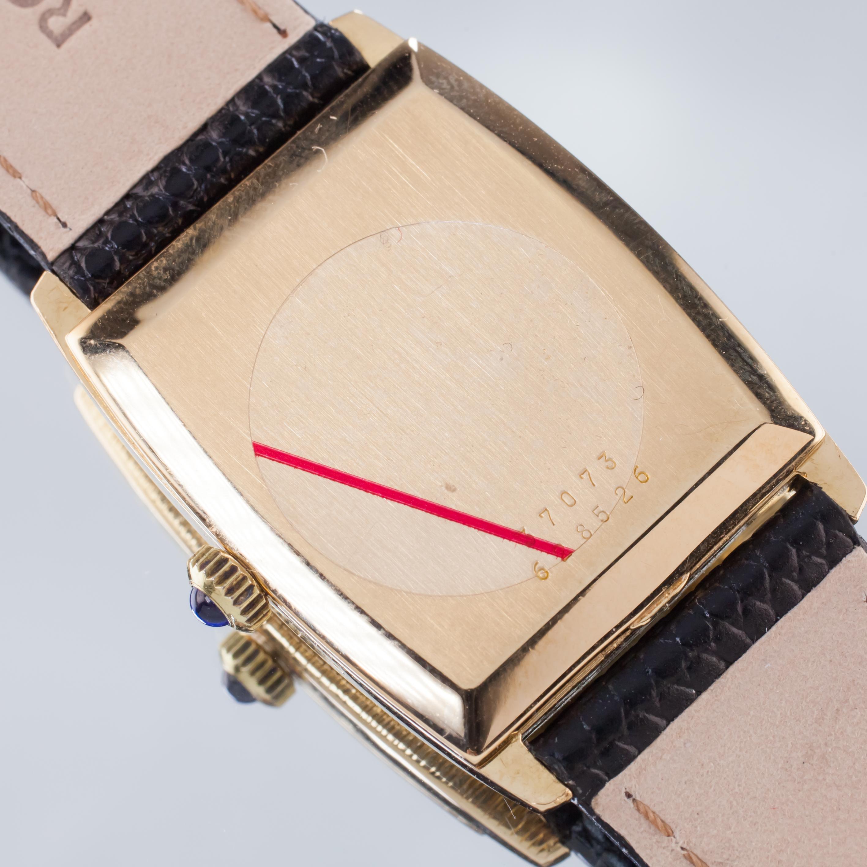 Movement: 1050 (Hand-Winding Mechanical Movement, 17 Jewels)
Case #37073
Serial #628526
18k Yellow Gold Tonneau Case w/ Wood Textured Finish
24 mm Wide (26 mm w/ Crown)
28 mm Long
Lug-to-Lug Width = 18 mm
Lug-to-Lug Distance = 36 mm
Oval Gold Dial