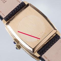 Baume & Mercier 18 Karat Gold Tonneau Hand-Winding Watch with Black Leather Band