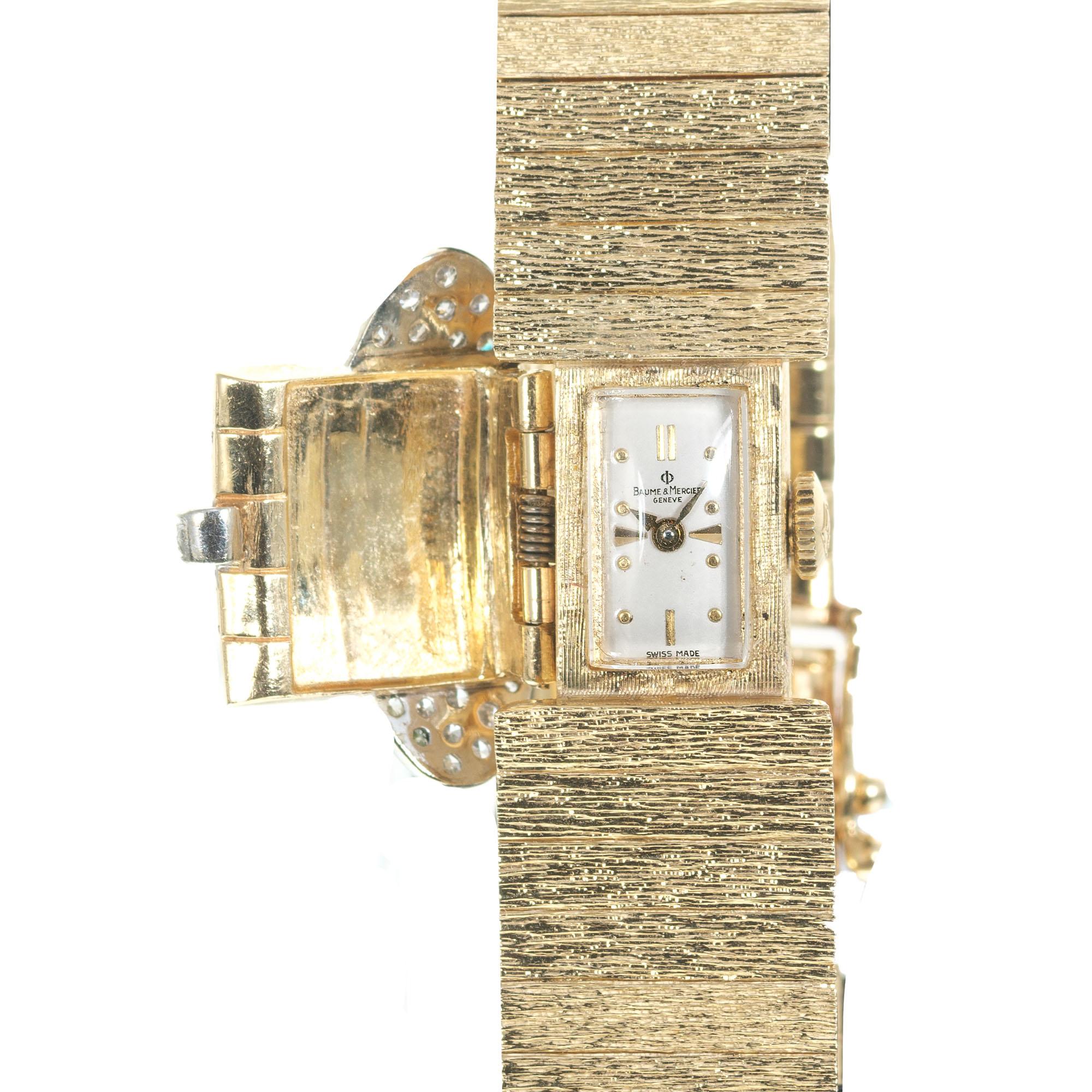 1950's hand textured 14k gold covered ladies watch with diamond accents set in 14k yellow gold 

32 diamonds, approx. .75cts
Length: 31.62mm
Width: 18.05mm
Band width at case: 15.05mm
Case thickness: 9.70mm
Band: 14k textured gold 
Crystal: