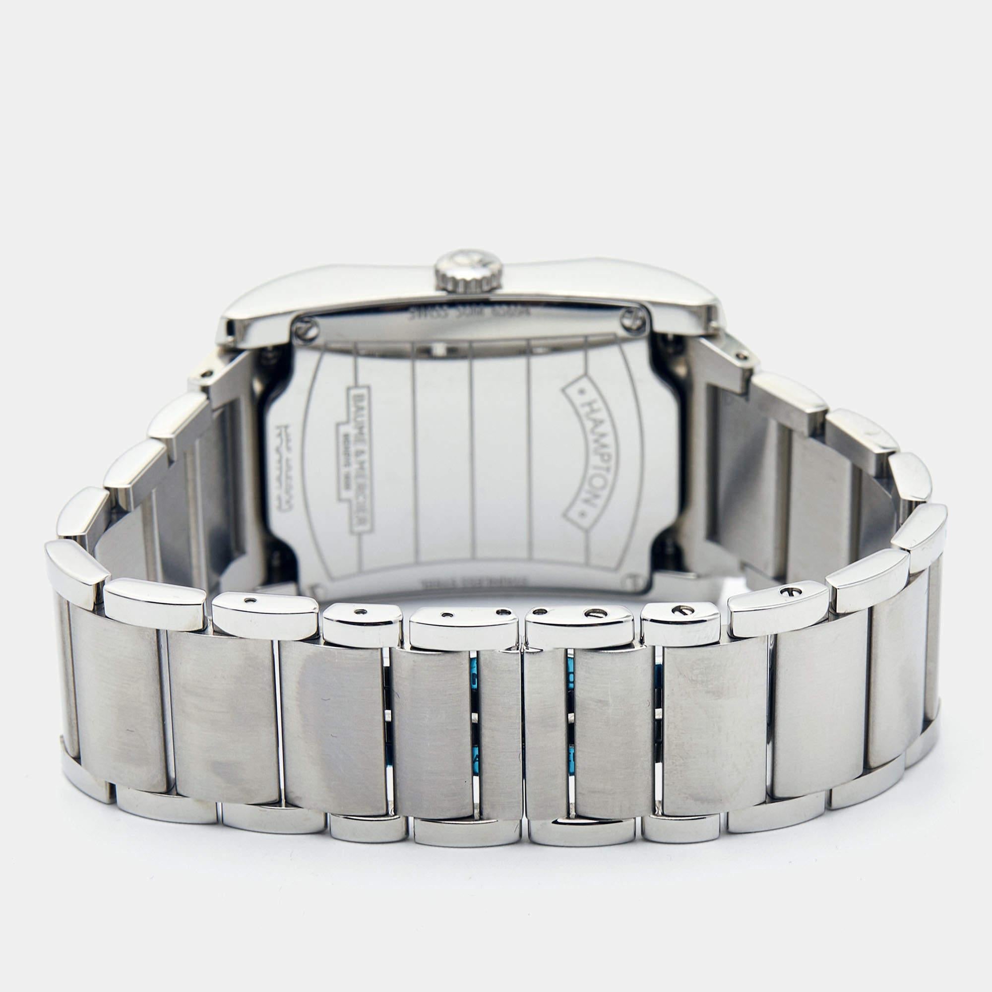 Upgrade your everyday look with this exquisite Baume & Mercier Hampton timepiece. The watch is made of stainless steel and flaunts diamonds on the bezel. The black dial is adorned with Arabic numeral hour markers and a date window. The watch has