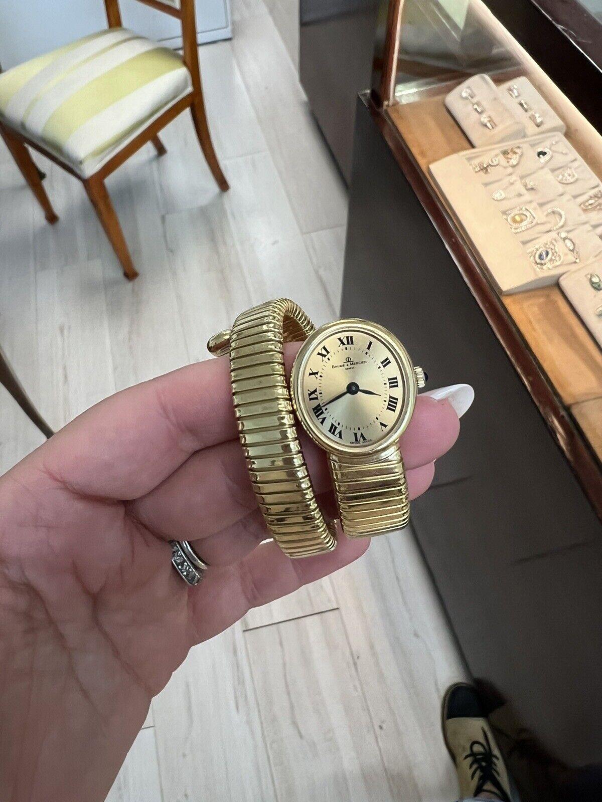 Baume Mercier by Carlo Weingrill 18k Yellow Gold Tubogas Wraparound Watch Bracelet Vintage Circa 1970s

Here is your chance to purchase a beautiful and highly collectible designer bracelet watch.  

The watch is by Swiss Brand Baume Mercier and