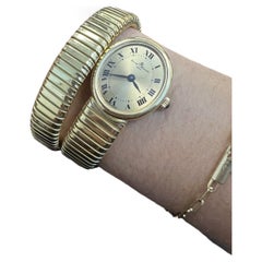 Retro BAUME MERCIER by CARLO WEINGRILL 18k YG Tubogas Wraparound Watch Bracelet 1970s