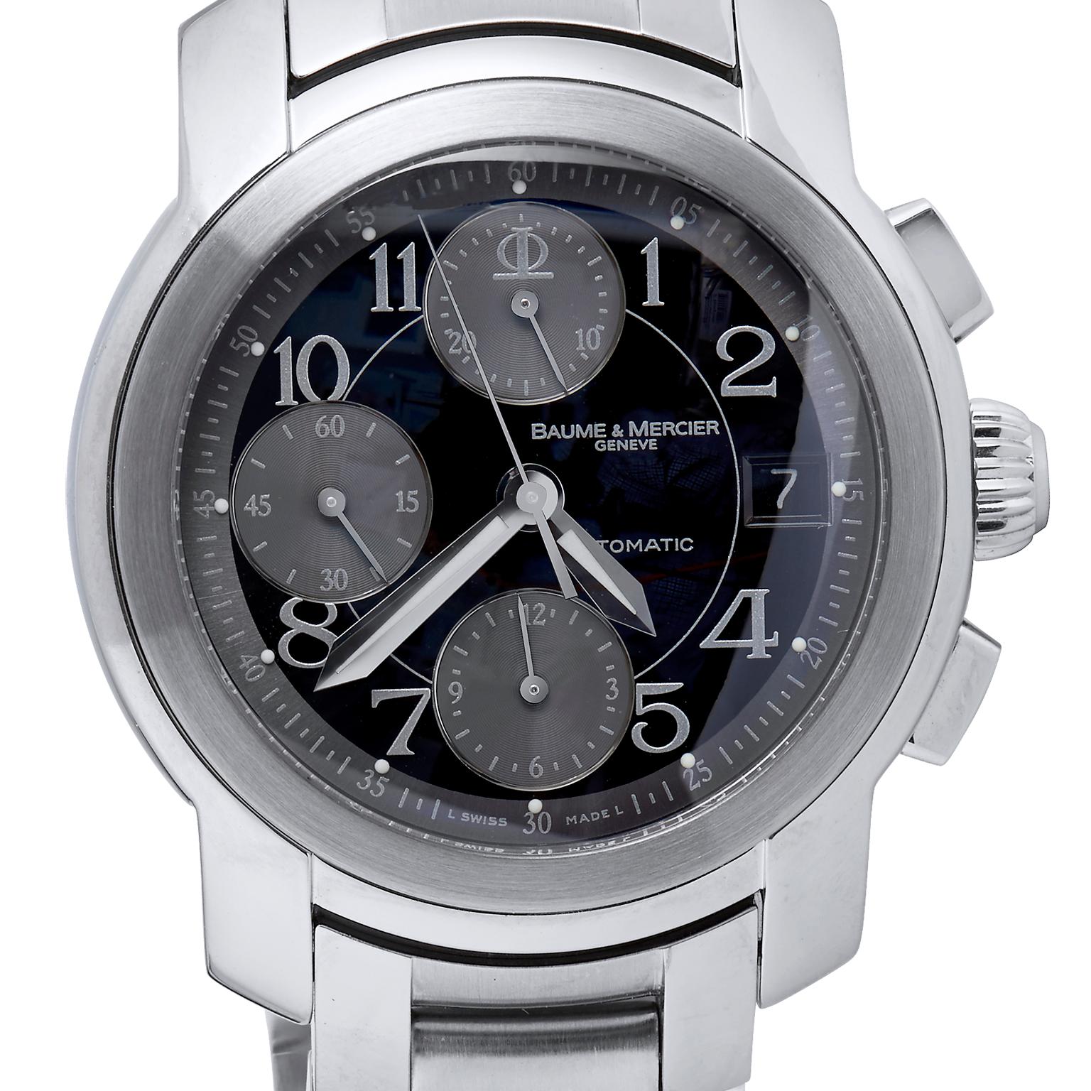 Men's Baume & Mercier Capeland stainless steel watch with a stainless steel case and bracelet. Fixed bezel. Grey dial with steel hands and index - Arabic numerals hour markers. Dial Type: Analog. Date display at the 3 o'clock position. Scratch