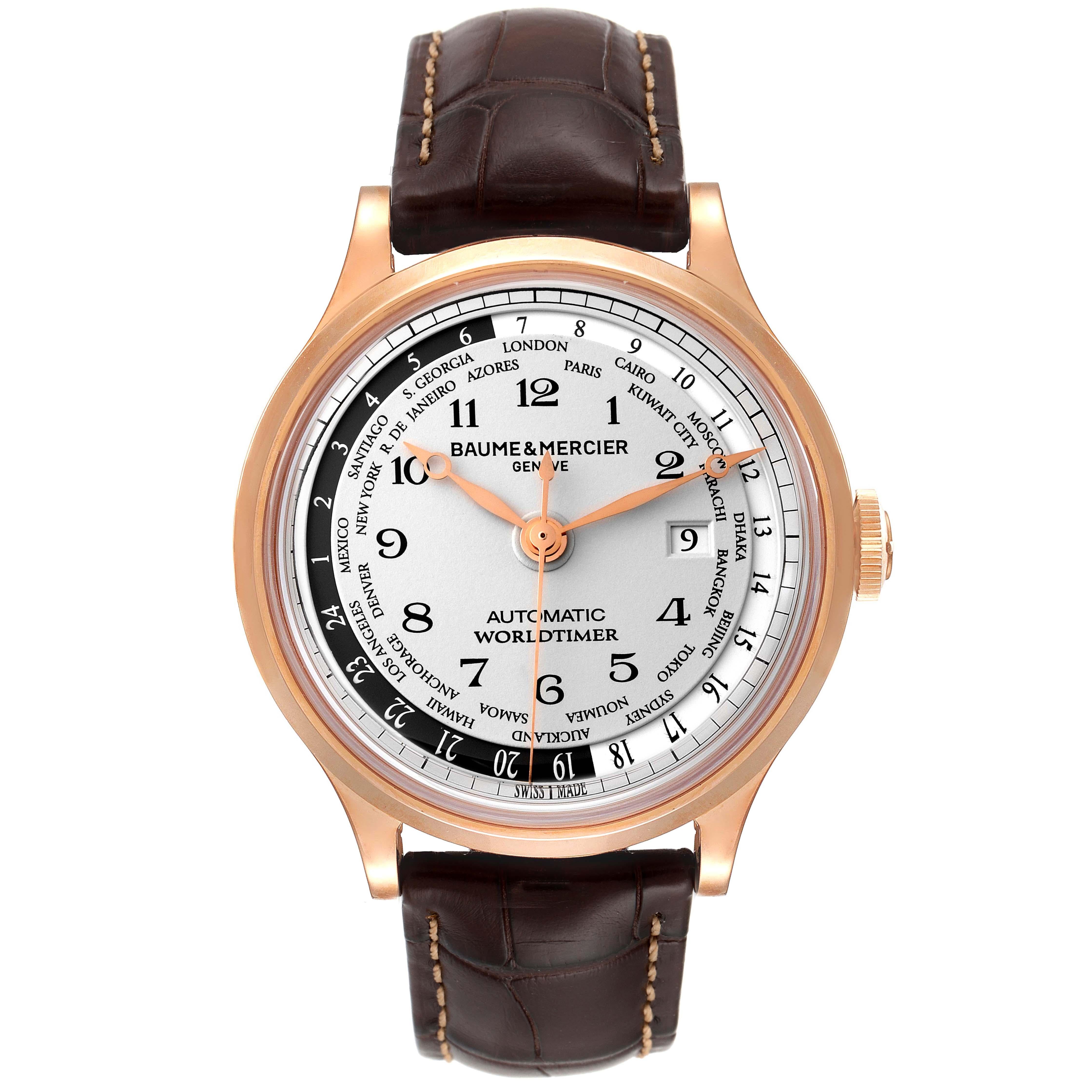 Baume Mercier Capeland Worldtimer Rose Gold  Mens Watch 10107. Automatic self-winding winding movement. 18k rose gold case 44.0 mm in diameter. Case thickness 14.2 mm. Exhibition sapphire case back. . Scratch resistent sapphire crystal. Silver dial
