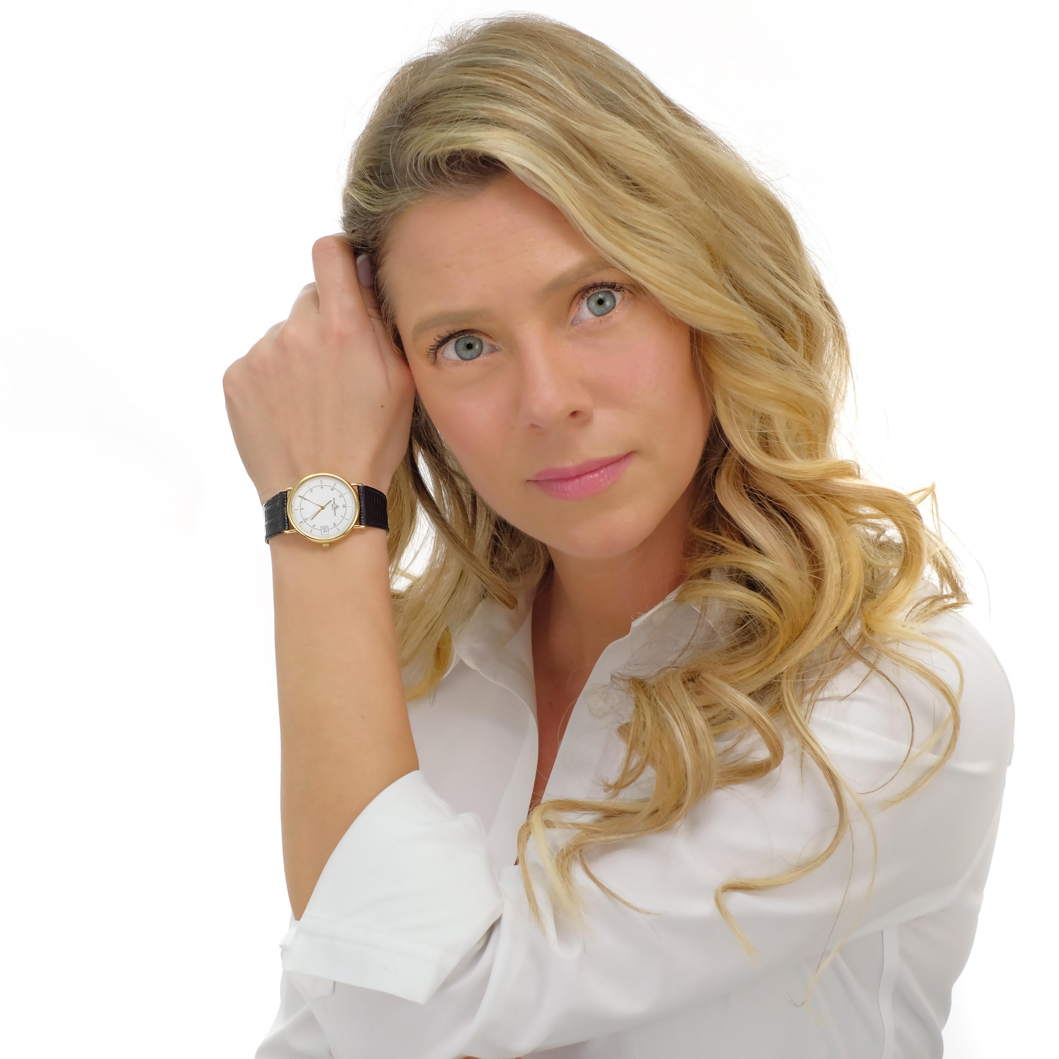 Circa 2000s, 18k, Baume & Mercier, Switzerland.  This classic Baume and Mercier 18k yellow gold quartz watch comes with an original leather band, outer box, inner box and papers.  It runs well, has a fresh battery, and is in excellent condition.