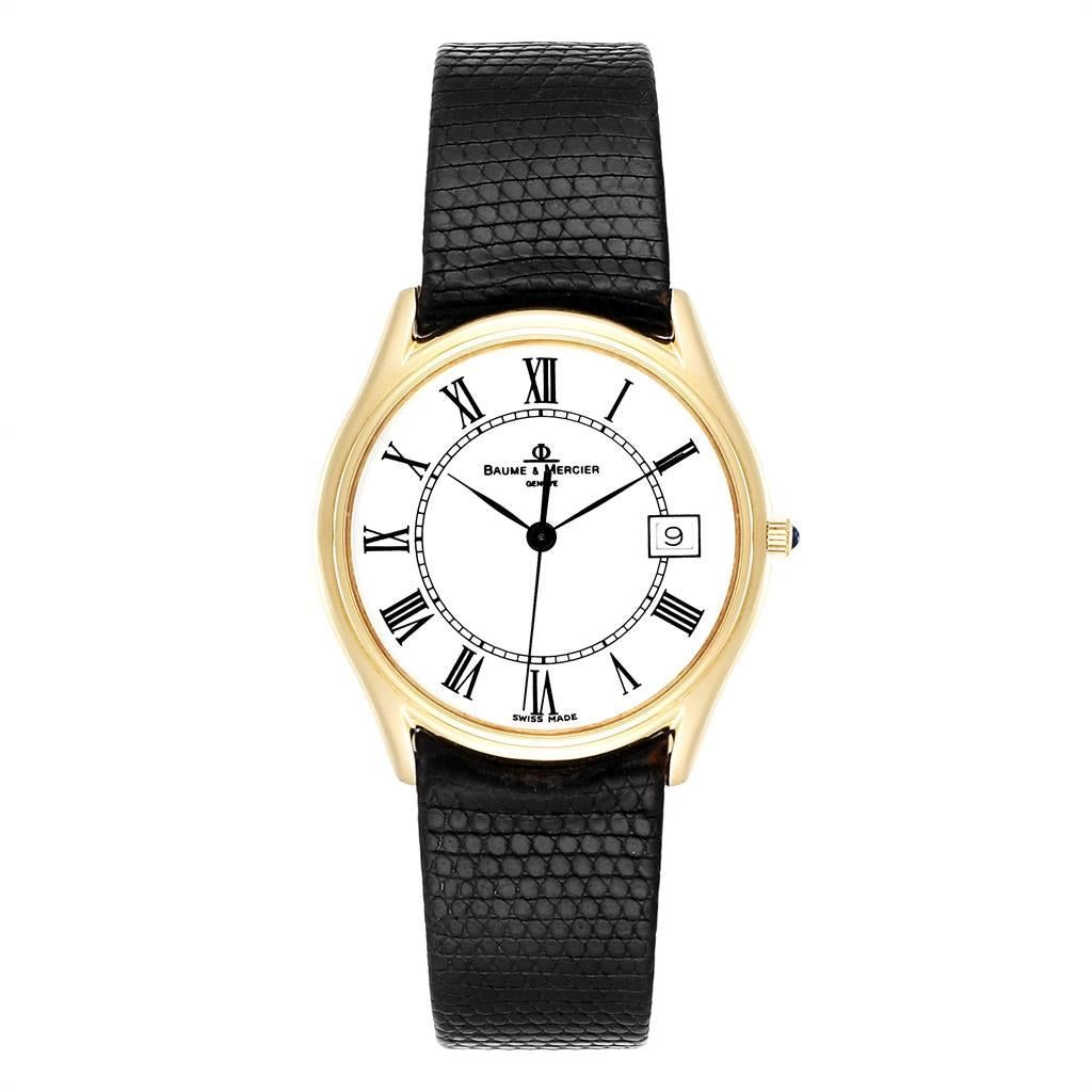 Baume Mercier Classima 14K Yellow Gold Mens Watch 95248. Manual winding movement. 14K yellow gold case 32.0 mm in diameter. Mineral glass crystal. White dial with Roman numerals. Black leather strap with gold plated tang buckle. Presentation generic