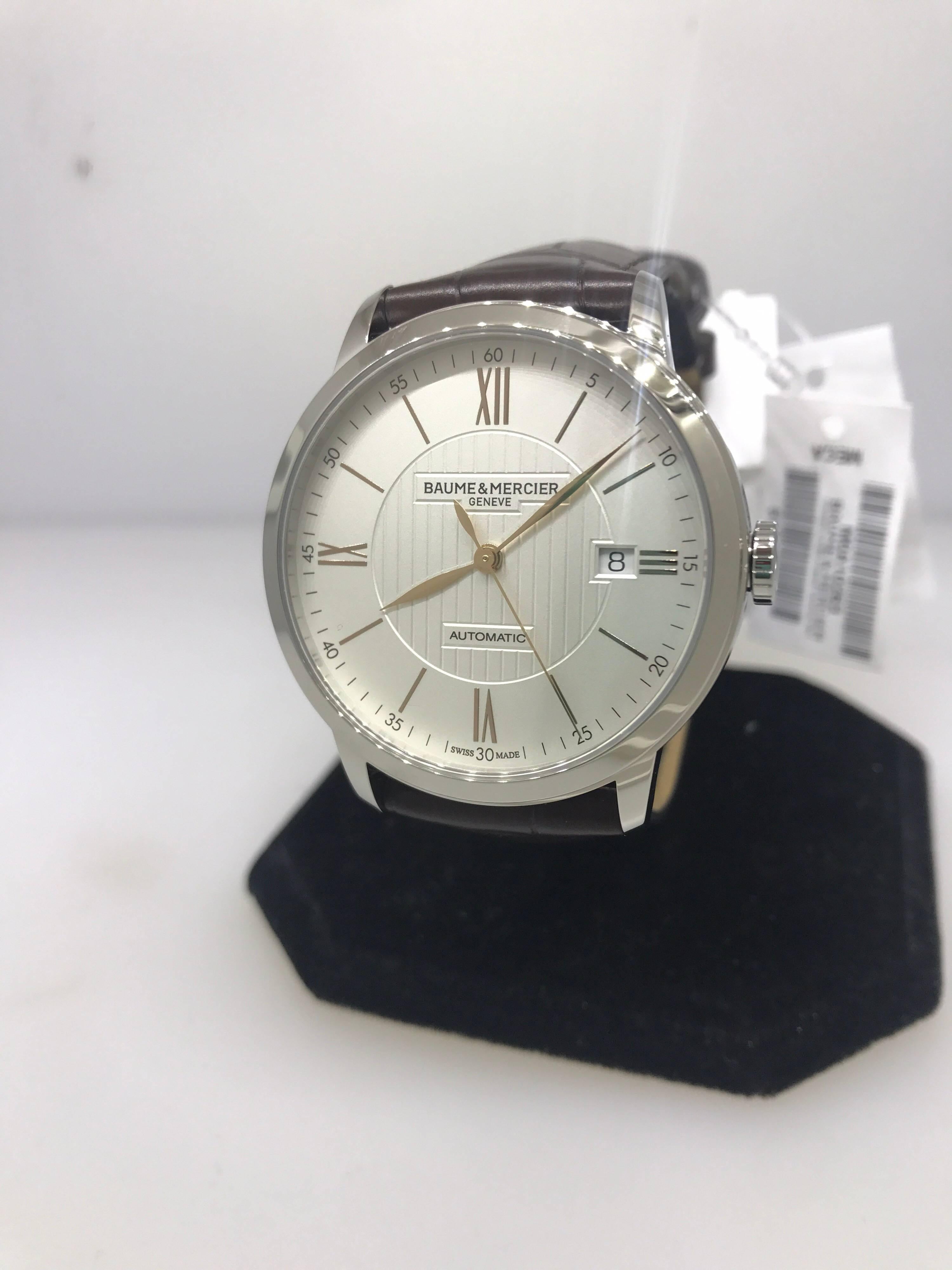 Baume & Mercier Classima Men's Watch

Model Number: M0A10263

Brand New

Comes with original Baume & Mercier box, warranty card, and insruction manual

Stainless Steel Case & Buckle

Silver Dial

Rose Gold Tone Roman Numeral & Index Hour