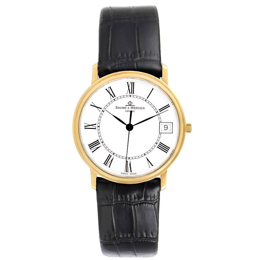 Baume Mercier Classima Ultra Thin 18K Yellow Gold Quartz Watch MV045093. Quartz movement. 18K yellow gold case 33.0 mm in diameter. . Mineral glass crystal. White dial with Roman numerals. Date window at 3 o'clock. Custom black leather strap with