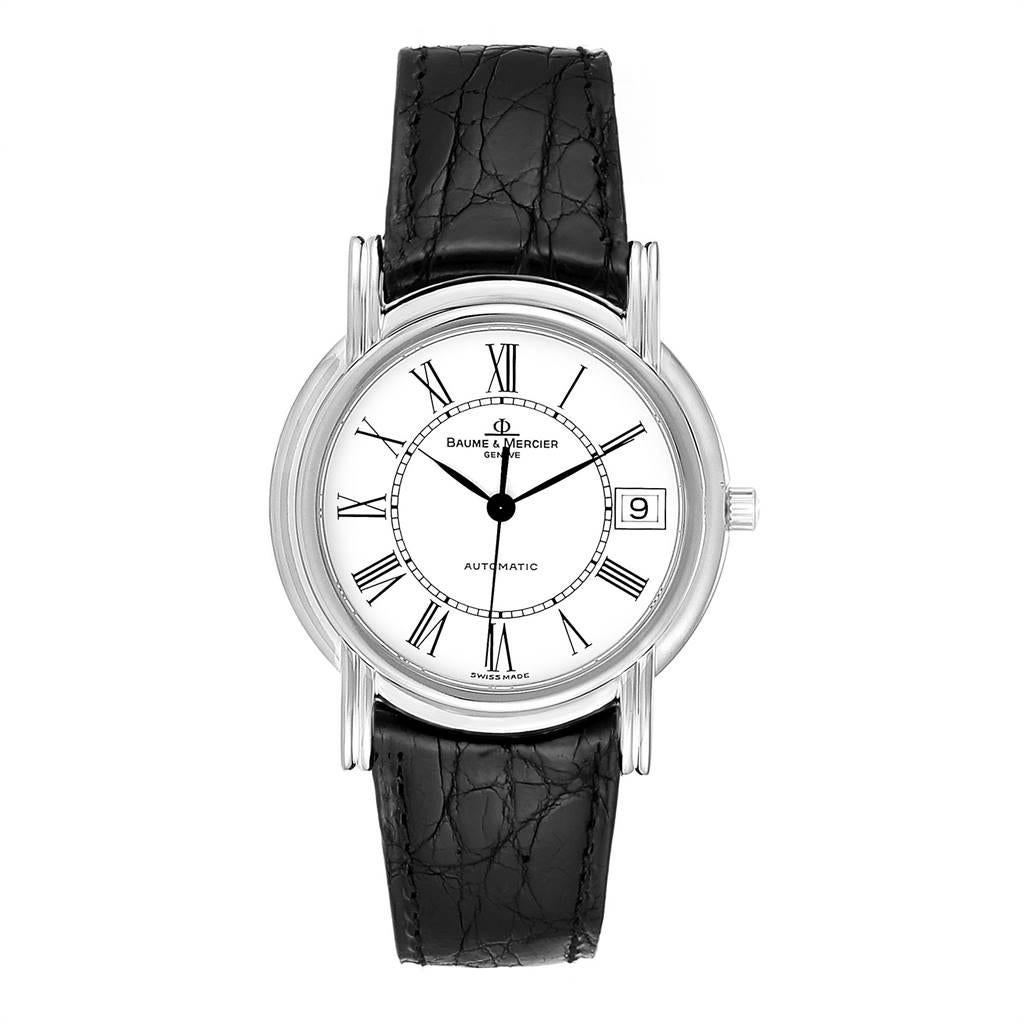 Baume Mercier Classima White Gold Mens Watch MV045077 Box Papers. Automatic self-winding movement. 18K white gold case 33.0 mm in diameter. Mineral glass crystal. White dial with Roman numerals. Black leather strap with white gold tang buckle. Baume
