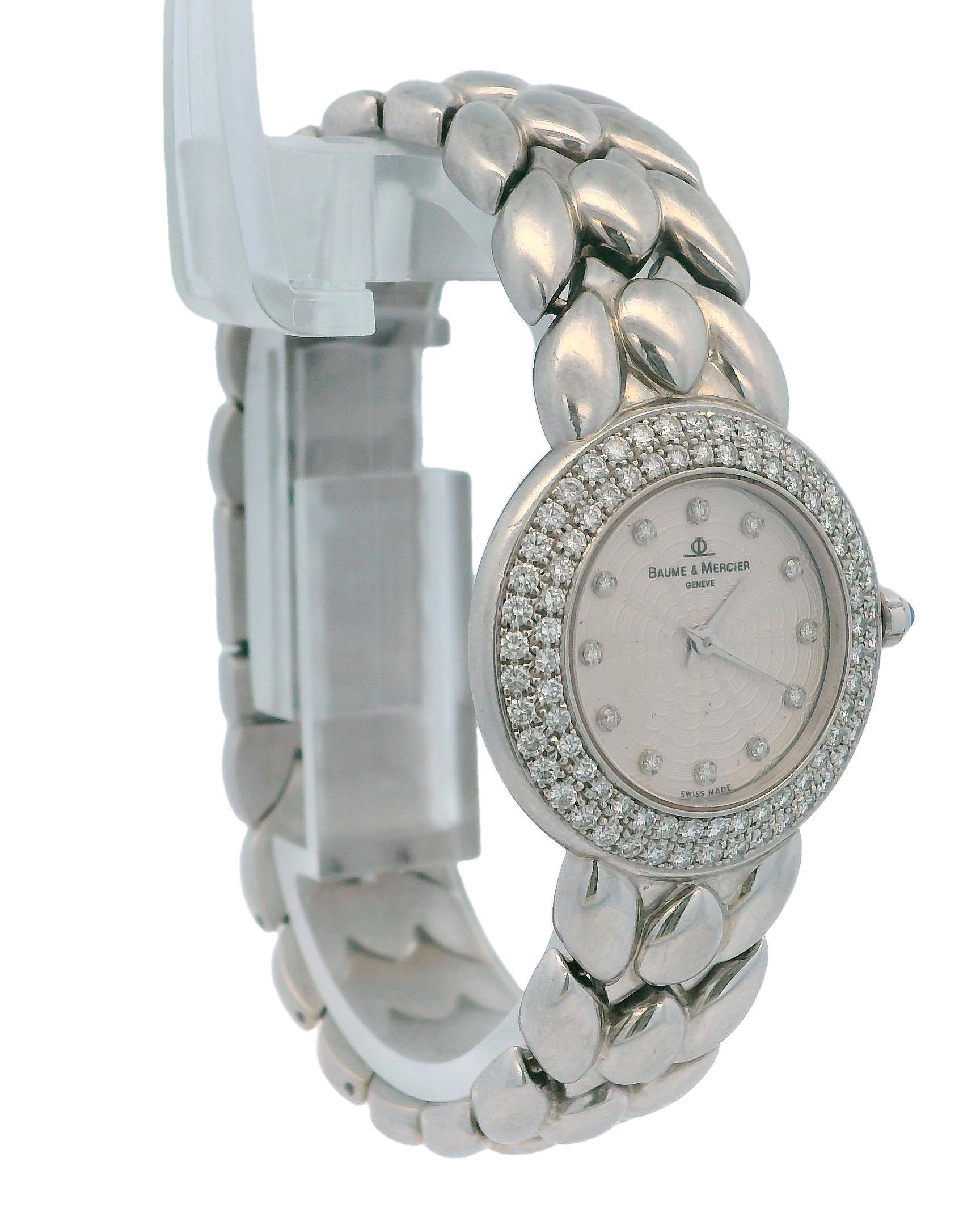 Baume & Mercier Classique 18kt White Gold Diamond Bezel Dress Watch (reference mvo35064) is a stunning luxury timepiece that embodies elegance and sophistication. Crafted from 18kt white gold, its exquisite diamond bezel enhances its opulence, while