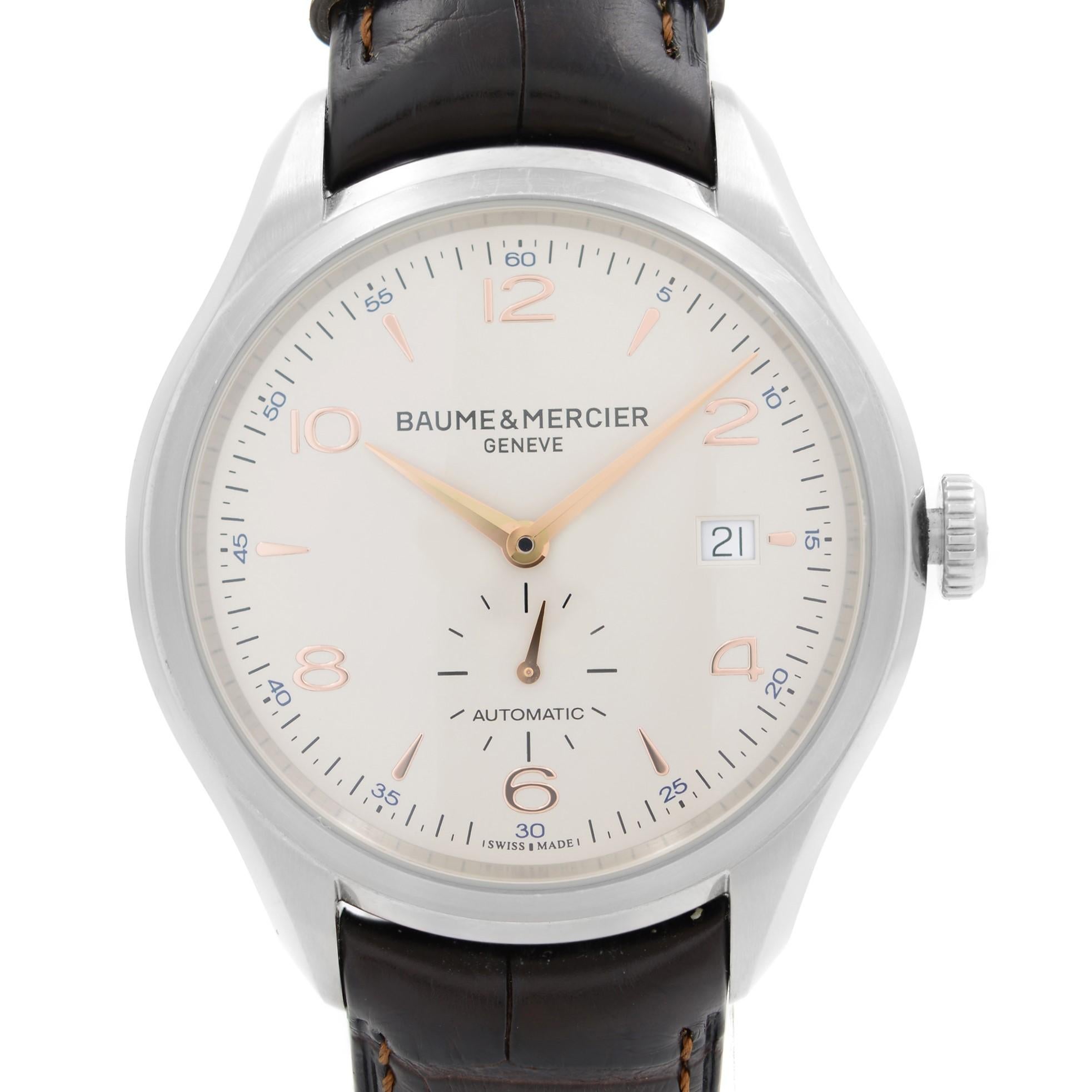 Pre-owned Baume & Mercier Clifton 41mm Steel Silver Dial Automatic Men's Watch M0A10054. The Watch Band Show wear and sweat signs on the Inner Side. No Original Box and Papers are Included. Comes with Chronostore Presentation Box and Authenticity